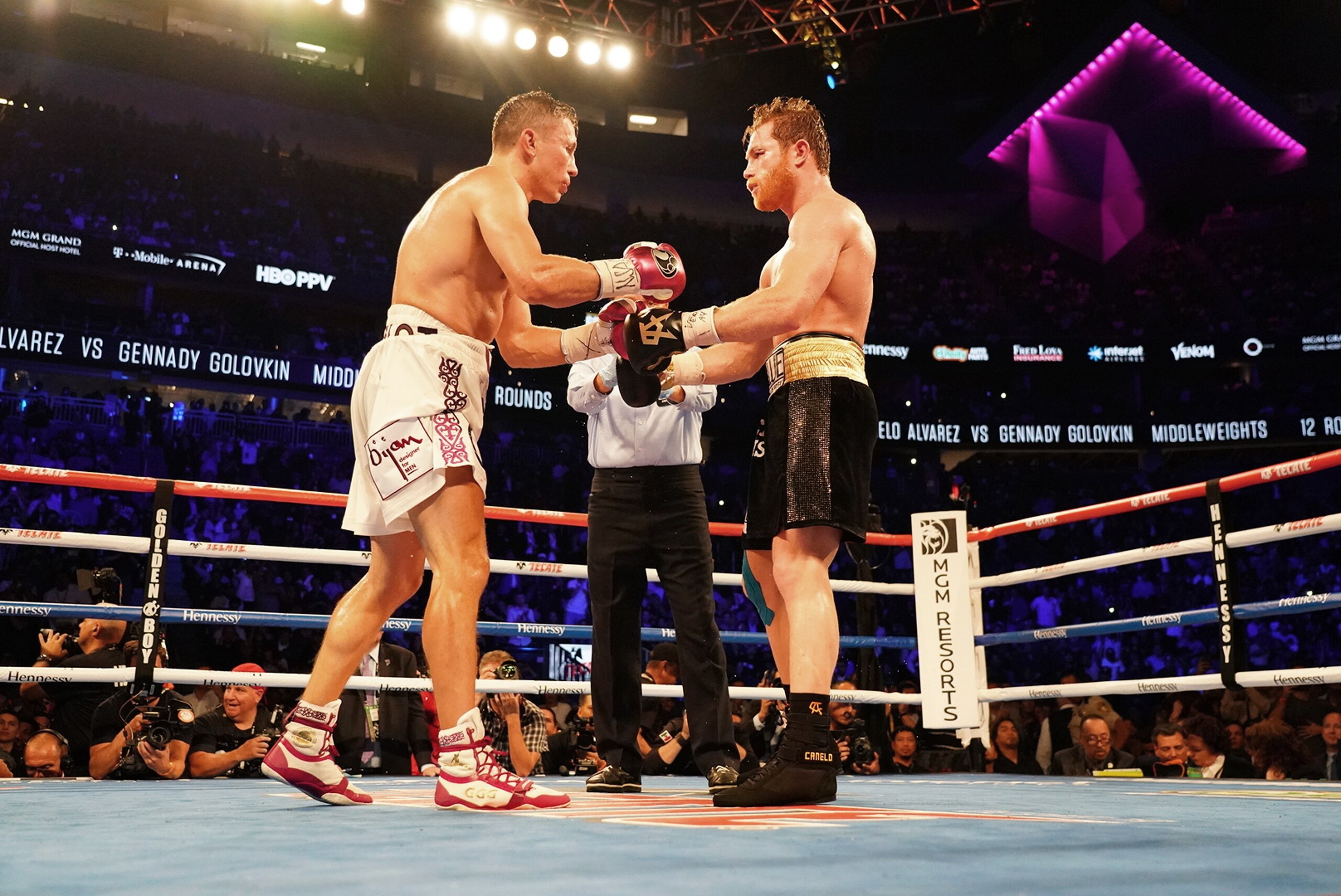 Boxing: WBA/WBC/IBO World Middleweight Title: Canelo Alvarez (black trunks) in action vs Gennady Golovkin (white trunks) during fight at T-Mobile Arena.
Las Vegas, NV 9/15/2018
CREDIT: Erick W. Rasco (Photo by Erick W. Rasco /Sports Illustrated via Getty Images)
(Set Number: X162141 TK1 ) Boxing: WBA/WBC/IBO World Middleweight Title: Canelo Alvarez (black trunks) in action vs Gennady Golovkin (white trunks) during fight at T-Mobile Arena.
Las Vegas, NV 9/15/2018
CREDIT: Erick W. Rasco (Photo by Erick W. Rasco /Sports Illustrated via Getty Images)
(Set Number: X162141 TK1 )