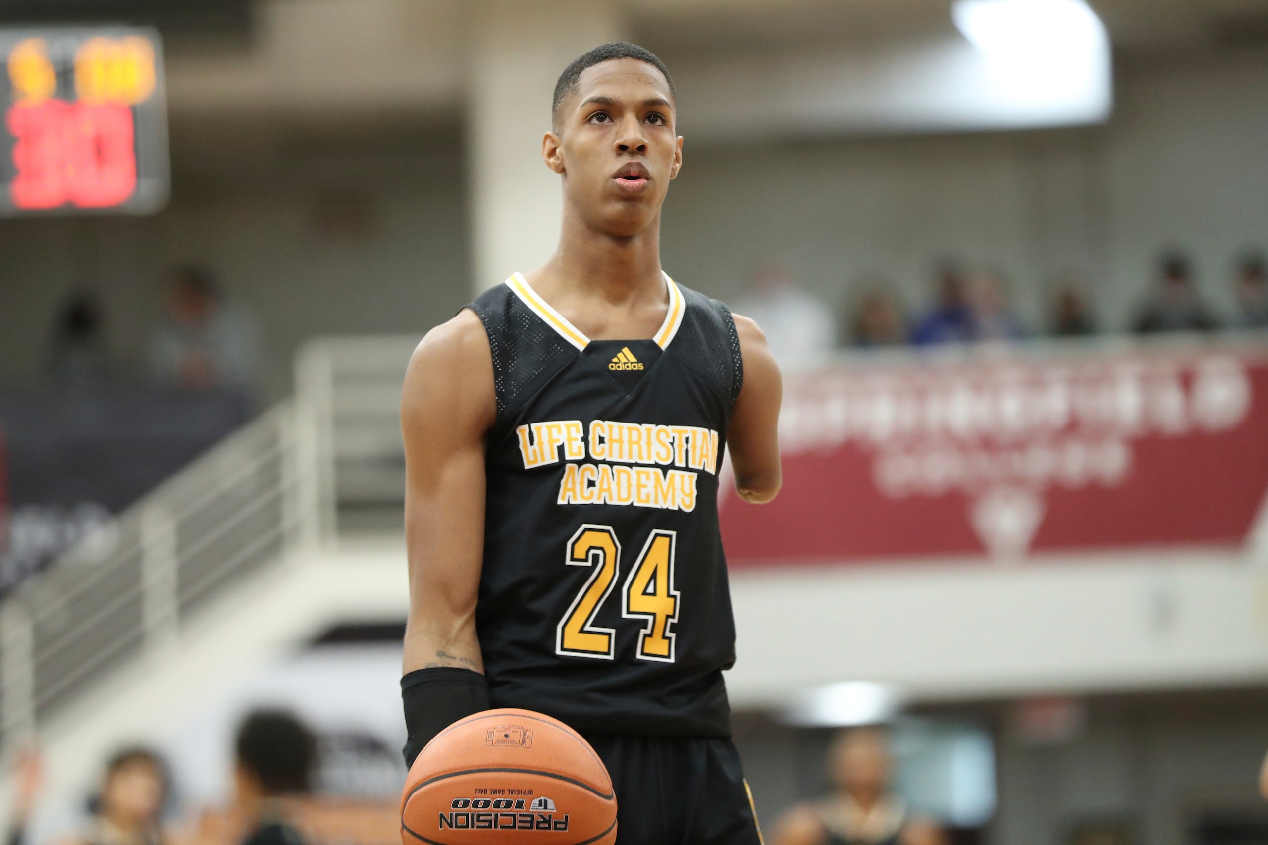 Life Christian Academy's Hansel-Enmanuel Donato #24 is seen against Wilbraham and Monson during a high school basketball game at the Hoophall Classic, Monday, January 17, 2022, in Springfield, MA. (AP Photo/Gregory Payan)