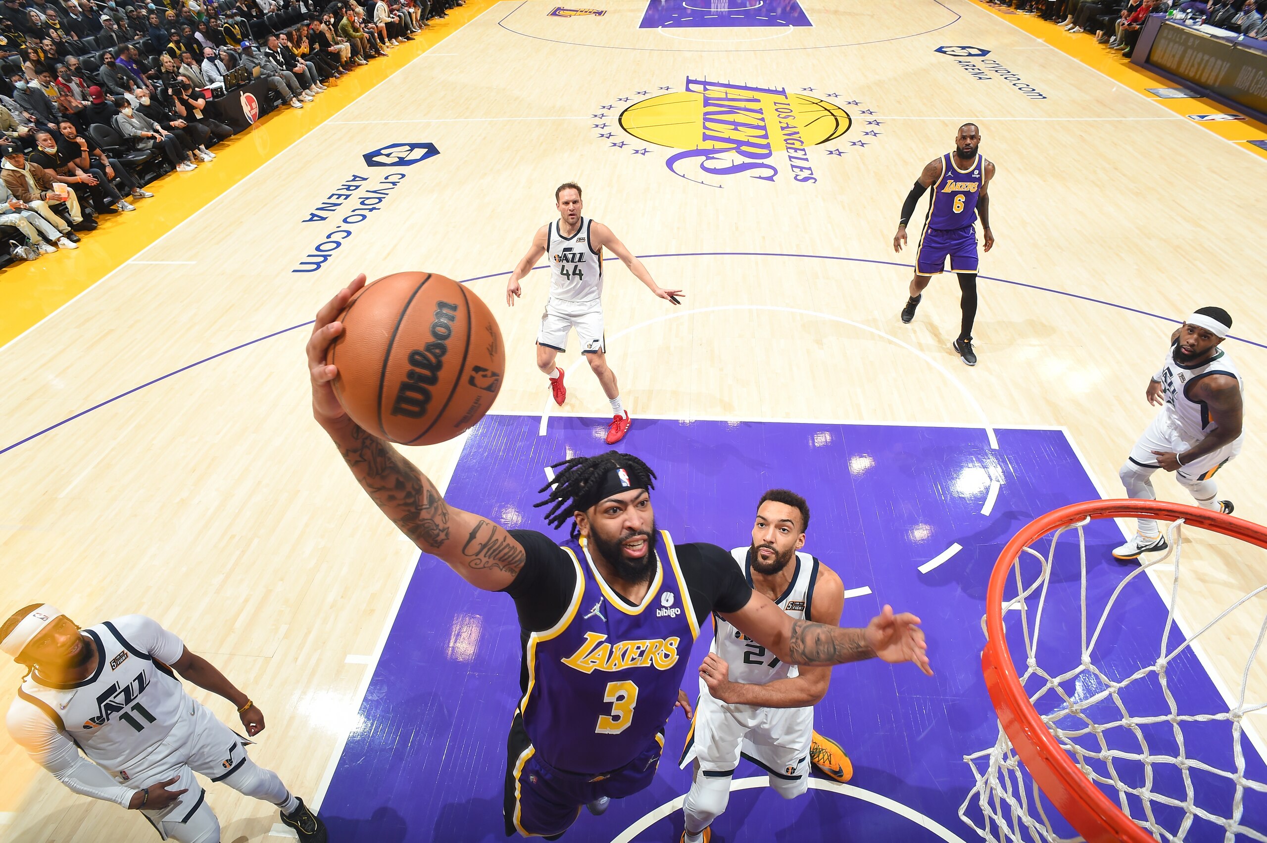 LOS ANGELES, CA - FEBRUARY 16: Anthony Davis #3 of the Los Angeles Lakers drives to the basket during the game against the Utah Jazz on February 16, 2022 at Crypto.Com Arena in Los Angeles, California. NOTE TO USER: User expressly acknowledges and agrees that, by downloading and/or using this Photograph, user is consenting to the terms and conditions of the Getty Images License Agreement. Mandatory Copyright Notice: Copyright 2022 NBAE (Photo by Andrew D. Bernstein/NBAE via Getty Images)