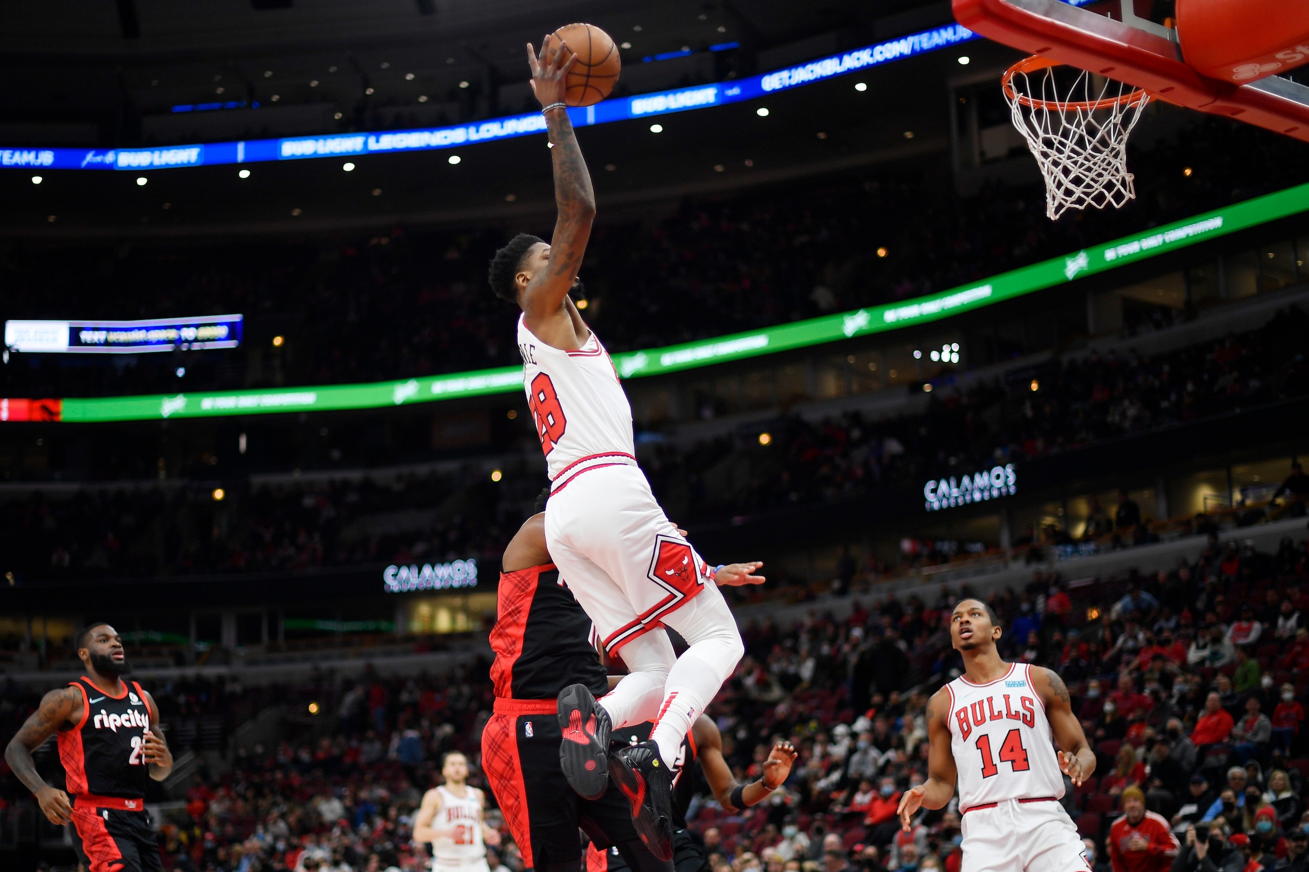 CHICAGO, ILLINOIS - JANUARY 30: Alfonzo McKinnie #28 of the Chicago Bulls shoots against the Portland Trail Blazers at United Center on January 30, 2022 in Chicago, Illinois.  NOTE TO USER: User expressly acknowledges and agrees that, by downloading and or using this photograph, User is consenting to the terms and conditions of the Getty Images License Agreement.  (Photo by Quinn Harris/Getty Images)