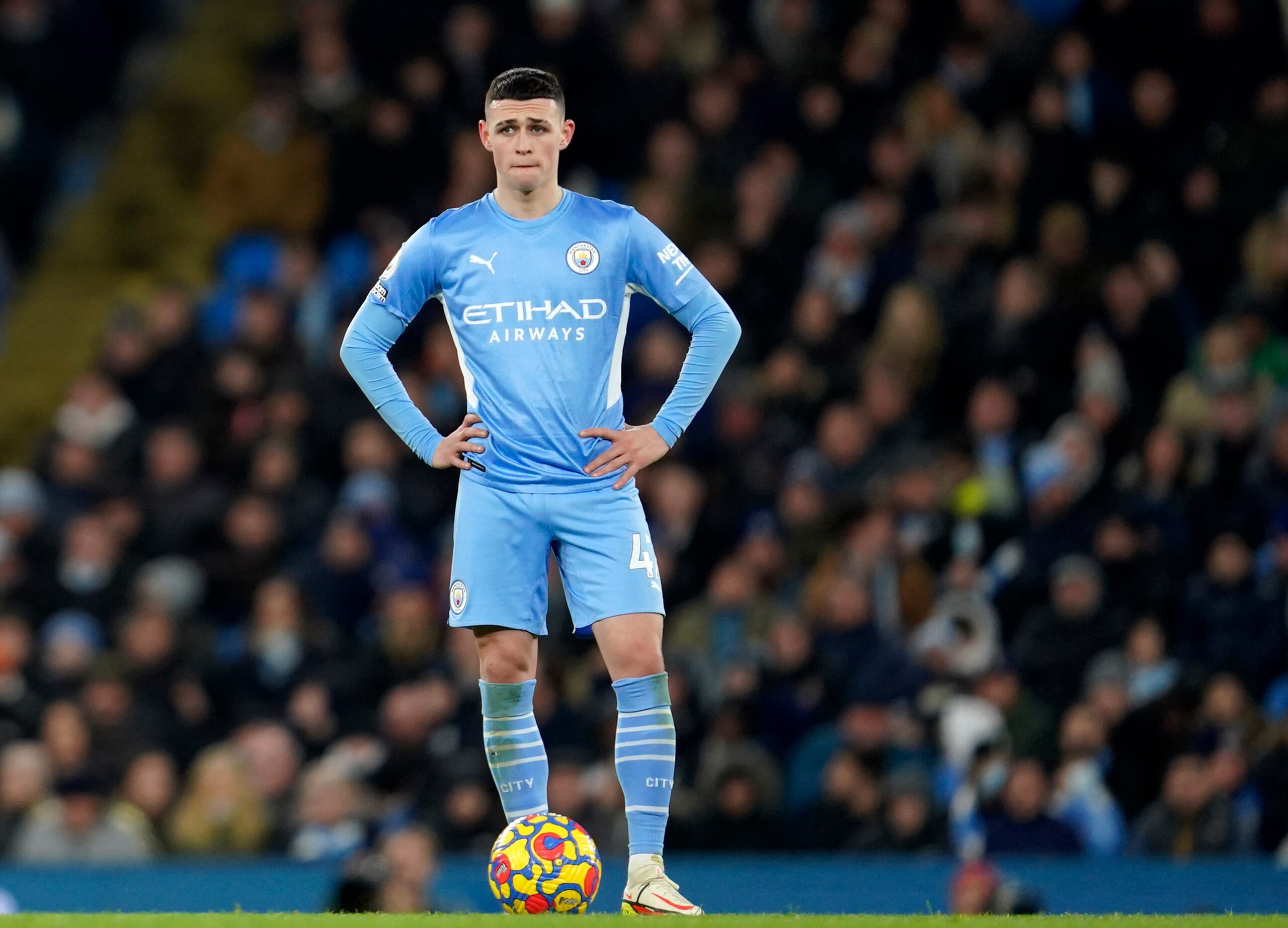 Manchester City's Phil Foden reacts during the English Premier League soccer match between Manchester City and Tottenham Hotspur, at the Etihad stadium in Manchester, England, Saturday, Feb. 19, 2022. (AP Photo/Jon Super)
