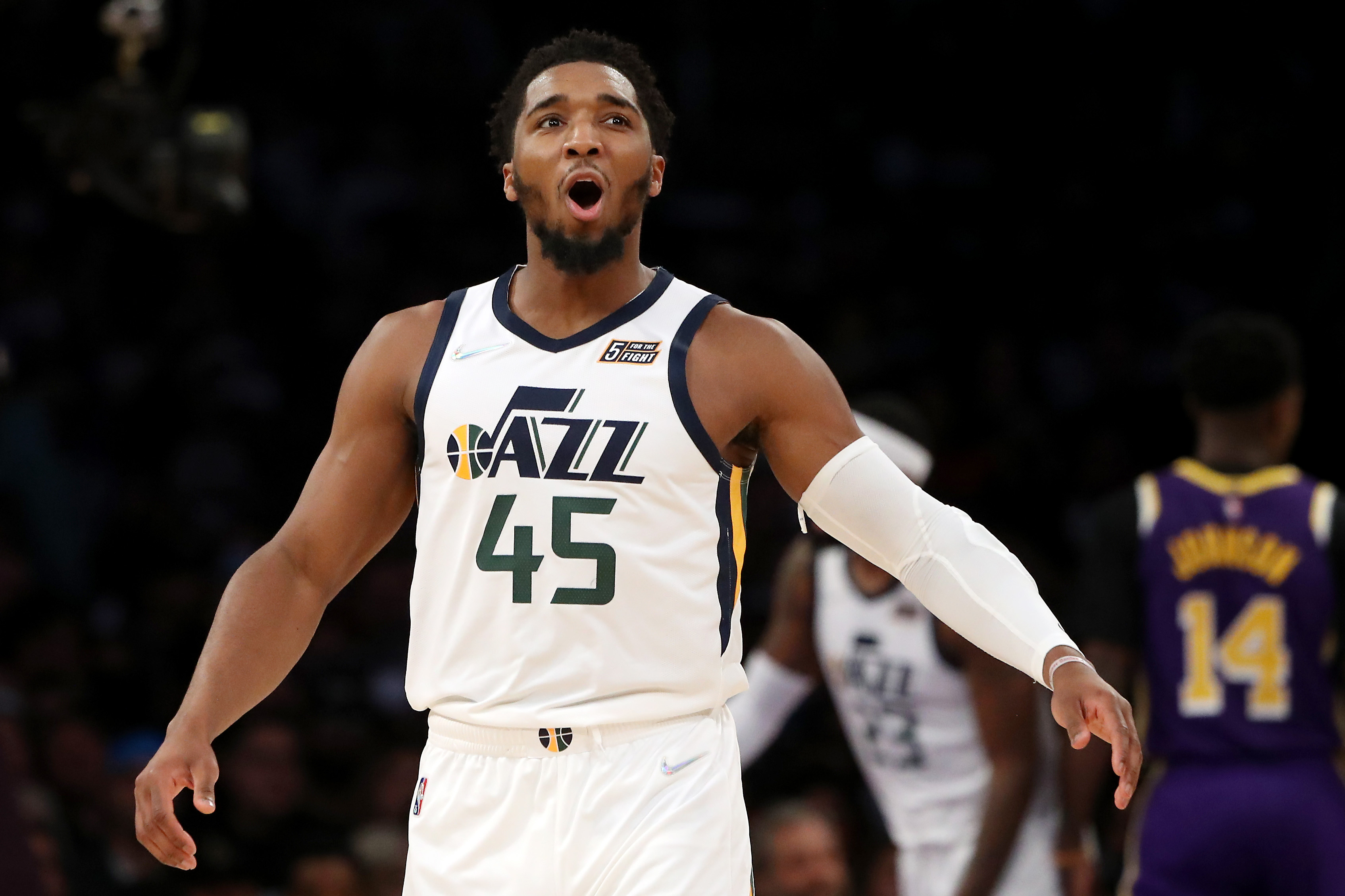 LOS ANGELES, CALIFORNIA - FEBRUARY 16: Donovan Mitchell #45 of the Utah Jazz reacts after a play during the second quarter against the Los Angeles Lakers at Crypto.com Arena on February 16, 2022 in Los Angeles, California. NOTE TO USER: User expressly acknowledges and agrees that, by downloading and or using this Photograph, user is consenting to the terms and conditions of the Getty Images License Agreement. (Photo by Katelyn Mulcahy/Getty Images)