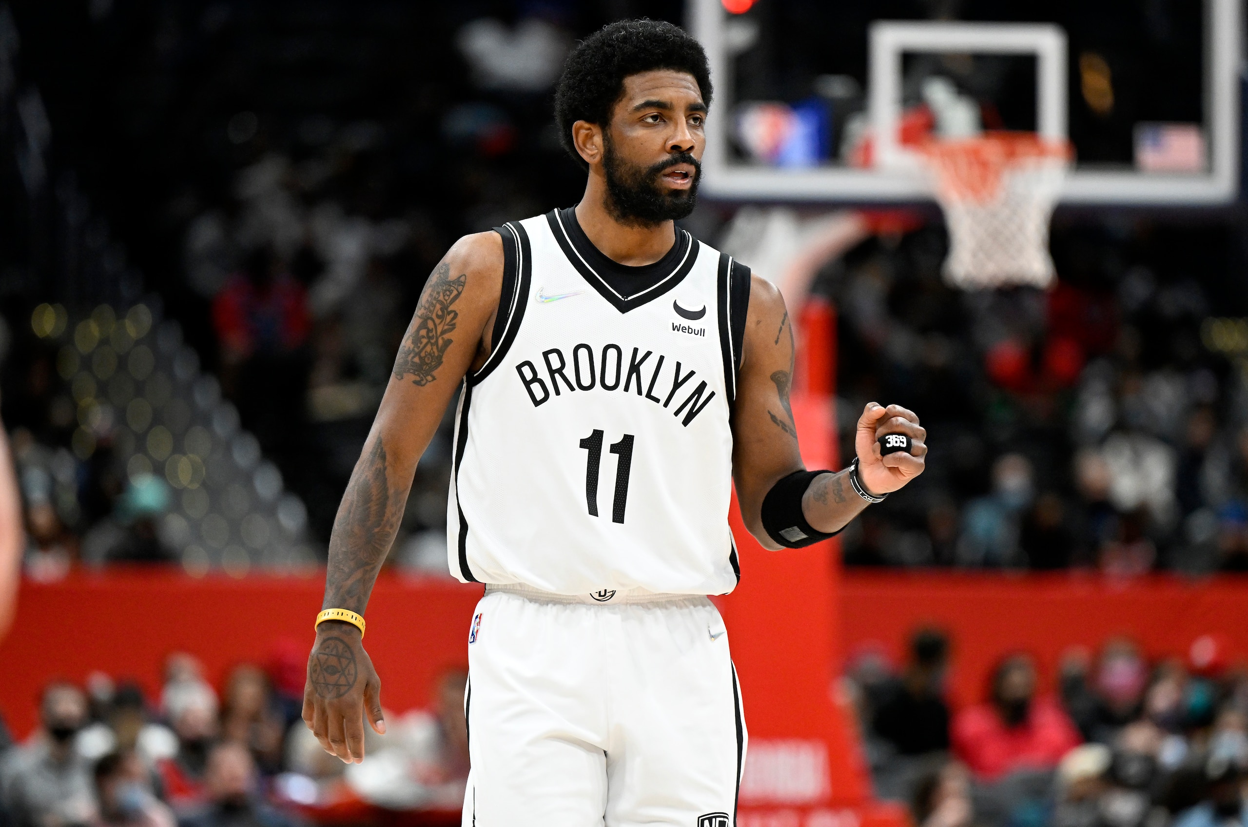 WASHINGTON, DC - FEBRUARY 10: Kyrie Irving #11 of the Brooklyn Nets gestures during the second quarter against the Washington Wizards at Capital One Arena on February 10, 2022 in Washington, DC. NOTE TO USER: User expressly acknowledges and agrees that, by downloading and or using this photograph, User is consenting to the terms and conditions of the Getty Images License Agreement.  (Photo by Greg Fiume/Getty Images)