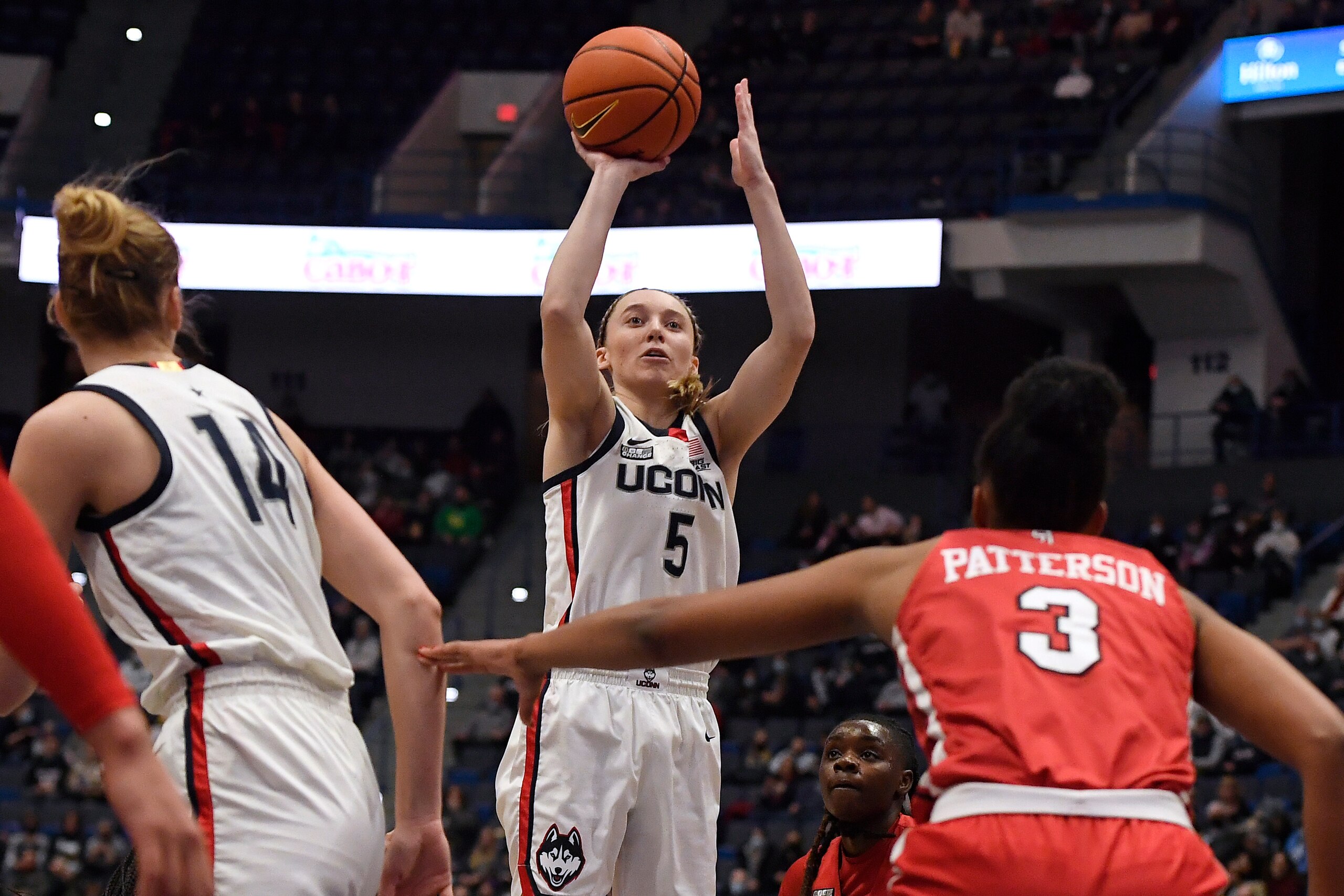 Connecticut's Paige Bueckers shoots her first basket against St. John's after returning from being injured, in the first half of an NCAA college basketball game, Friday, Feb. 25, 2022, in Hartford, Conn. (AP Photo/Jessica Hill)