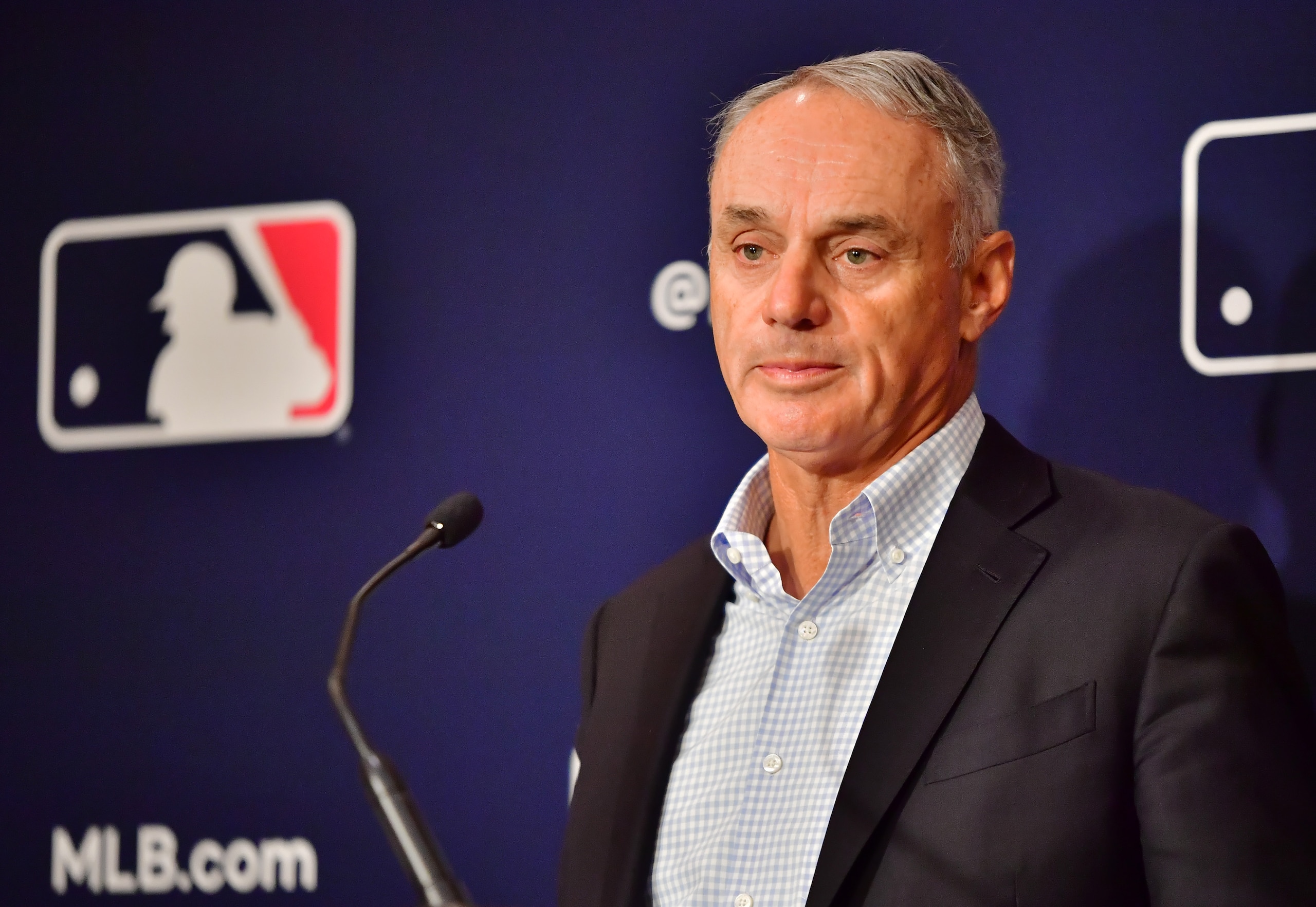 ORLANDO, FLORIDA - FEBRUARY 10: Major League Baseball Commissioner Rob Manfred answers questions during an MLB owner's meeting at the Waldorf Astoria on February 10, 2022 in Orlando, Florida. Manfred addressed the ongoing lockout of players, which owners put in place after the league's collective bargaining agreement ended on December 1, 2021. (Photo by Julio Aguilar/Getty Images)