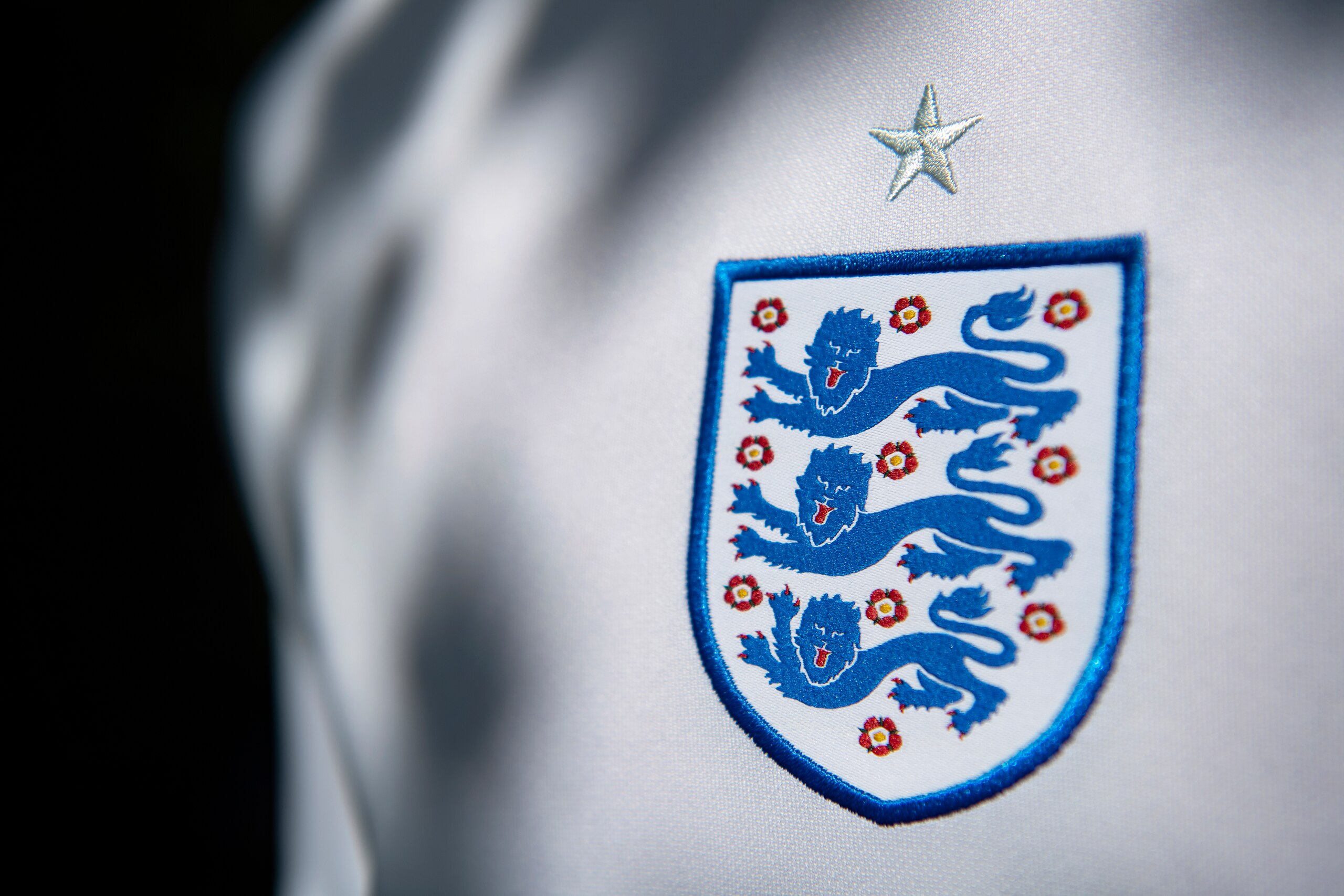 MANCHESTER, ENGLAND - MAY 27: The England badge showing the three lions on their home shirt ahead of the UEFA 2020 European Football Championship on May 27, 2021 in Manchester, United Kingdom. (Photo by Visionhaus/Getty Images)