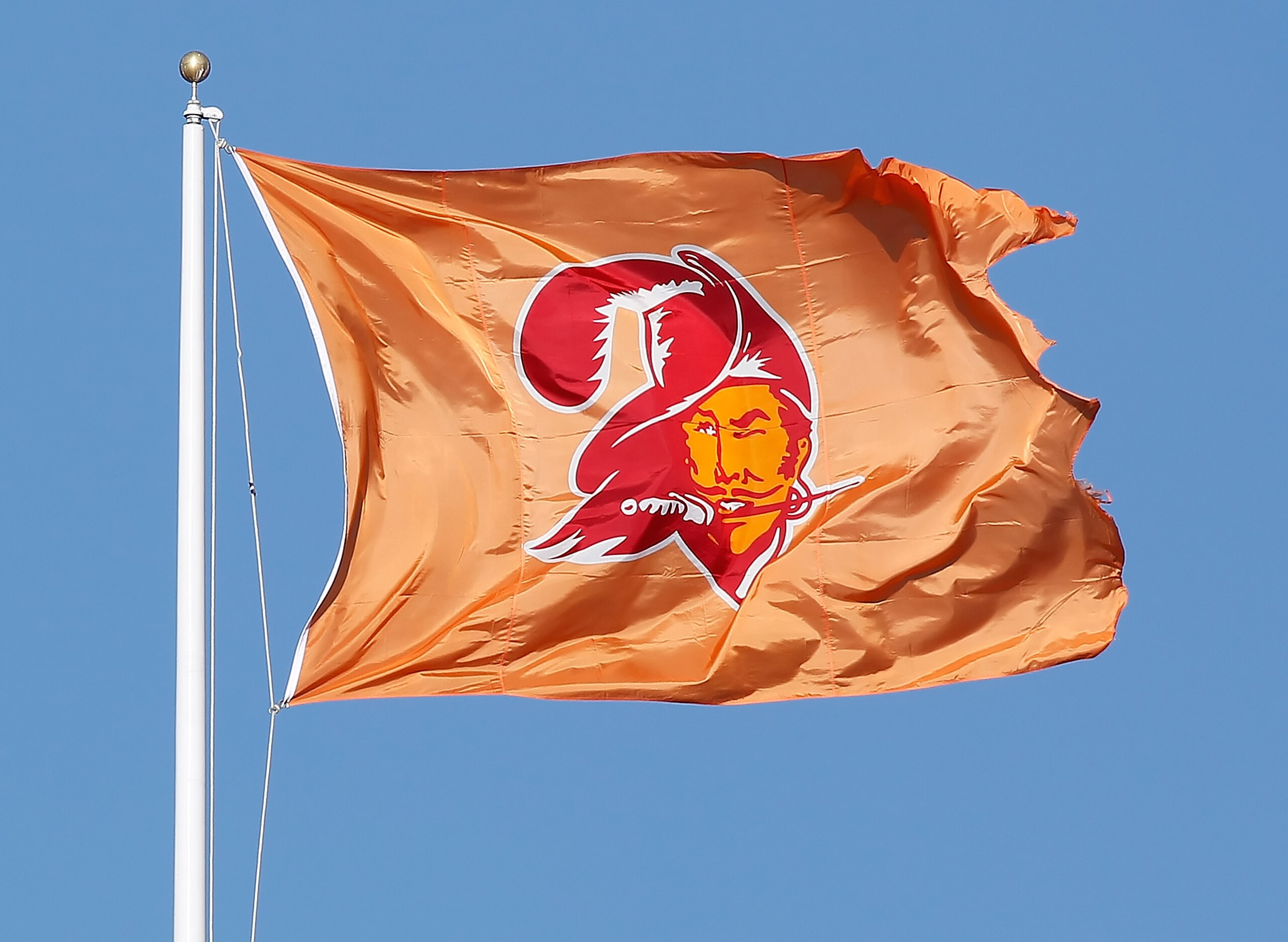 TAMPA, FL - DECEMBER 05:  A "throwback Bucco Bruce Flag" of the Tampa Bay Buccaneers flies over Raymond James Stadium just before the start of the game against the Atlanta Falcons on December 5, 2010 in Tampa, Florida.  (Photo by J. Meric/Getty Images)