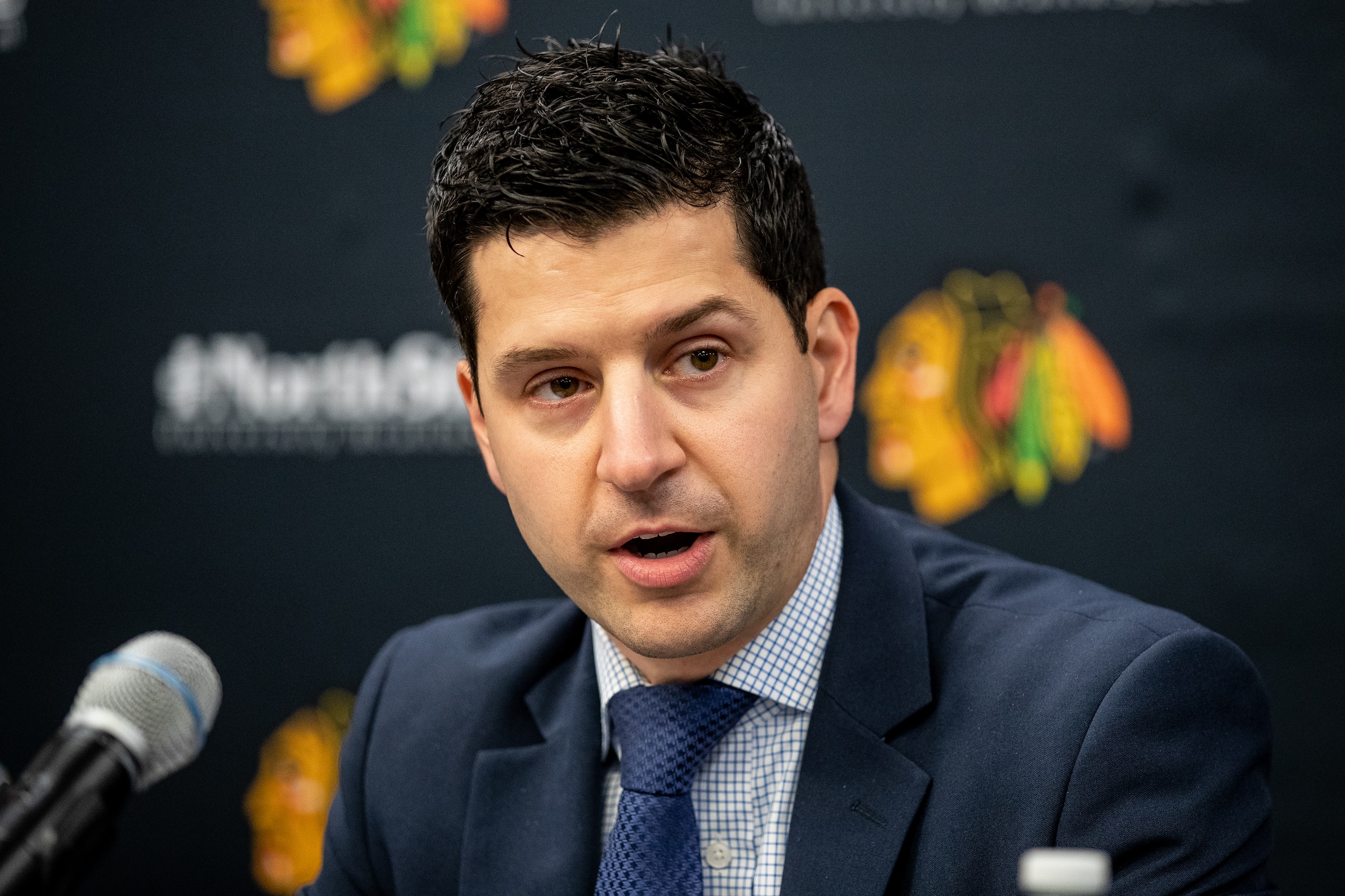 CHICAGO, ILLINOIS - NOVEMBER 7: Chicago Blackhawks interim General Manager Kyle Davidson addresses the media at United Center on November 7, 2021 in Chicago, Illinois. (Photo by Chase Agnello-Dean/NHLI via Getty Images)