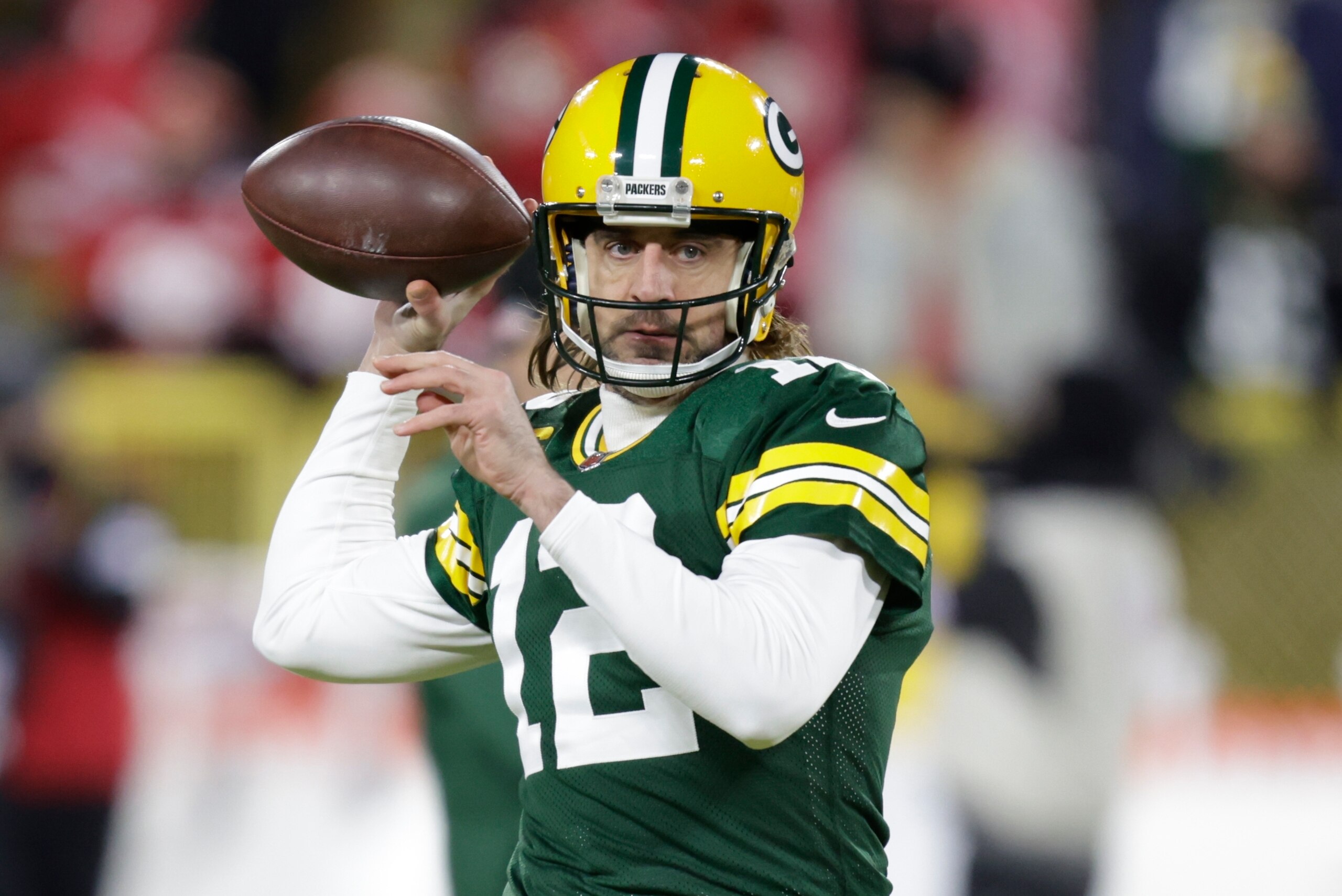 Green Bay Packers' Aaron Rodgers warms up before an NFC divisional playoff NFL football game against the San Francisco 49ers Saturday, Jan. 22, 2022, in Green Bay, Wis. (AP Photo/Matt Ludtke) Green Bay Packers' Aaron Rodgers warms up before an NFC divisional playoff NFL football game against the San Francisco 49ers Saturday, Jan. 22, 2022, in Green Bay, Wis. (AP Photo/Matt Ludtke)