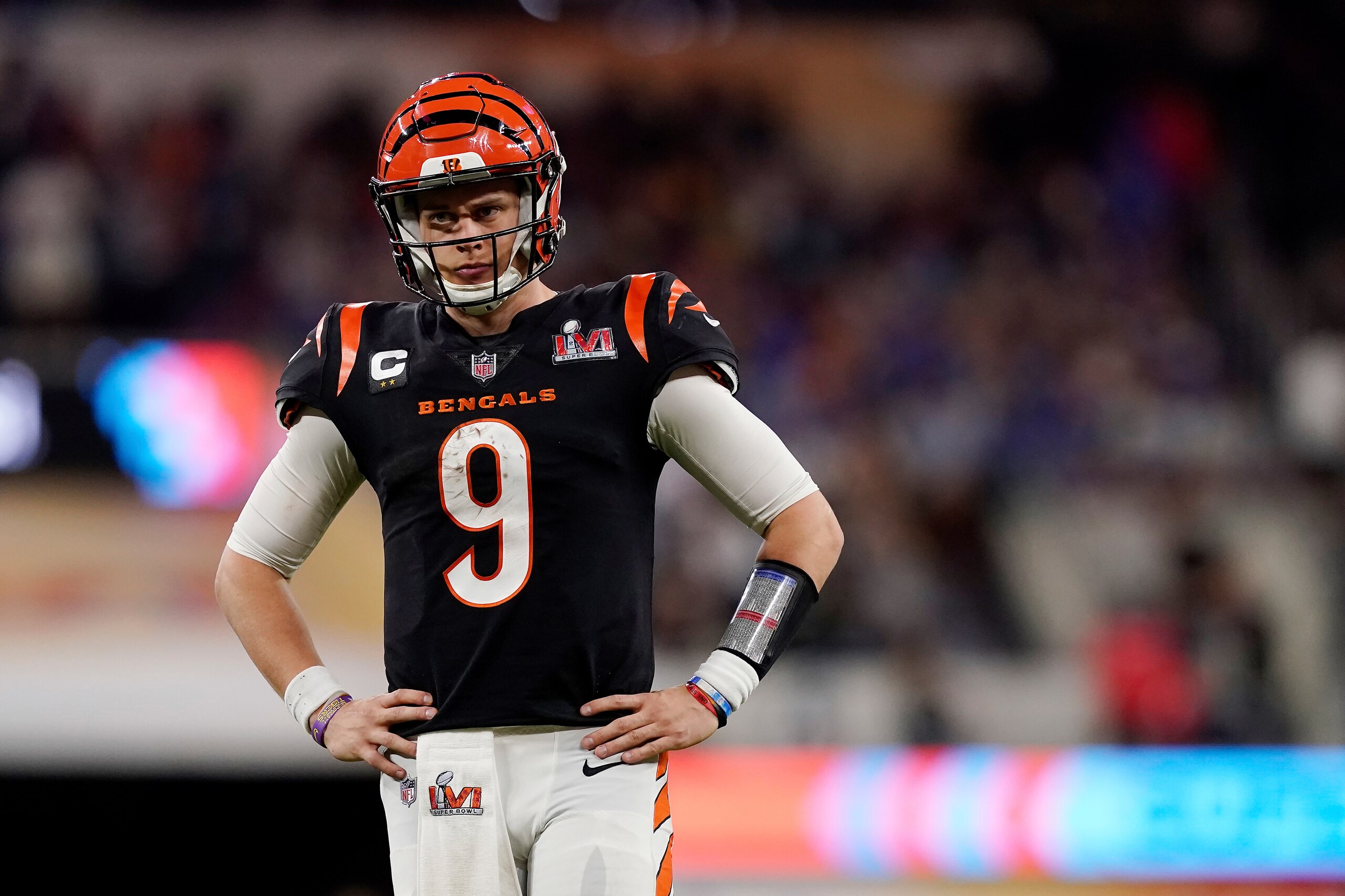 Cincinnati Bengals quarterback Joe Burrow (9) looks on between plays during the NFL Super Bowl 56 football game against the Los Angeles Rams Sunday, Feb. 13, 2022, in Inglewood, Calif. (AP Photo/Steve Luciano)