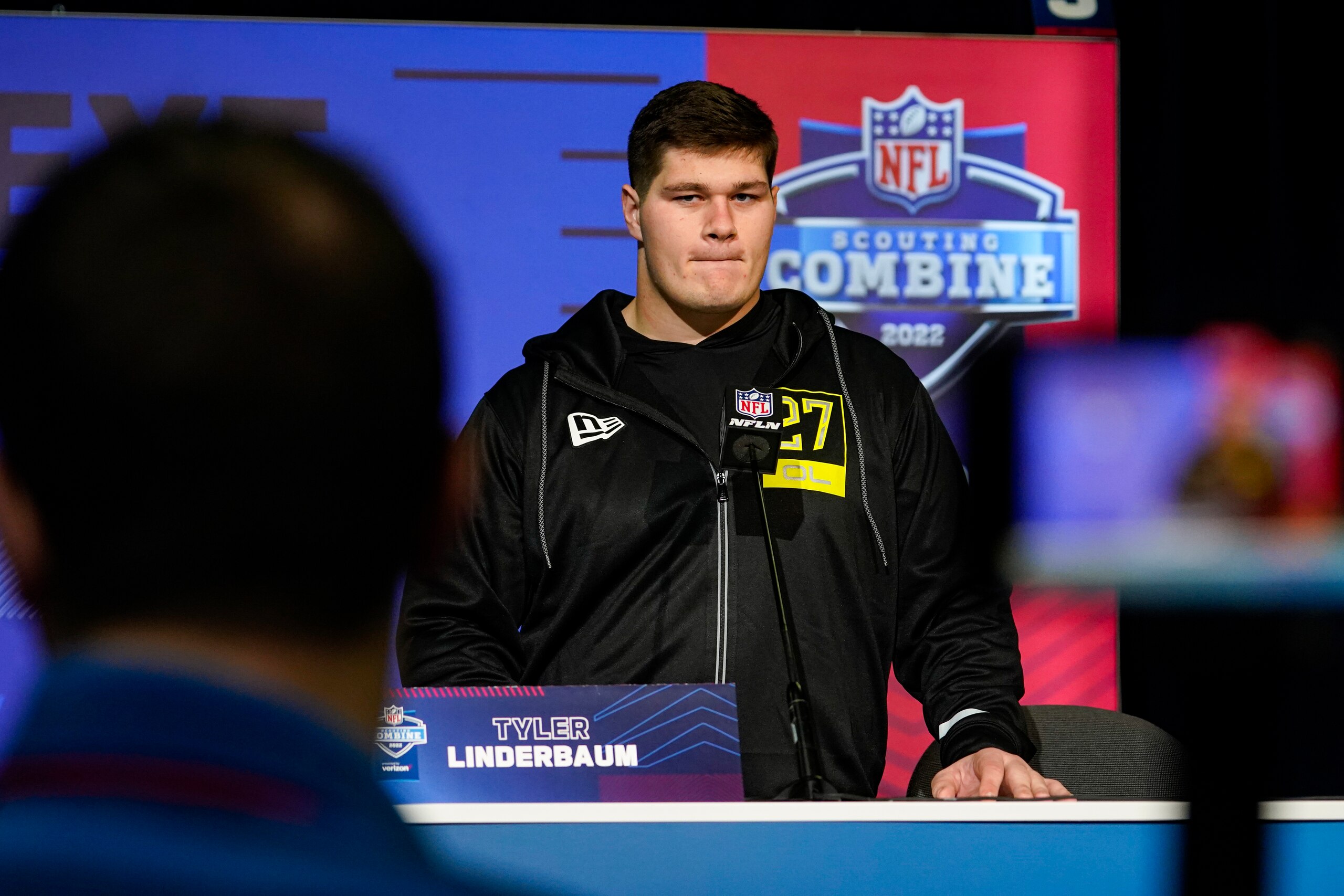Iowa offensive lineman Tyler Linderbaum speaks during a press conference at the NFL football scouting combine in Indianapolis, Thursday, March 3, 2022. (AP Photo/Michael Conroy)