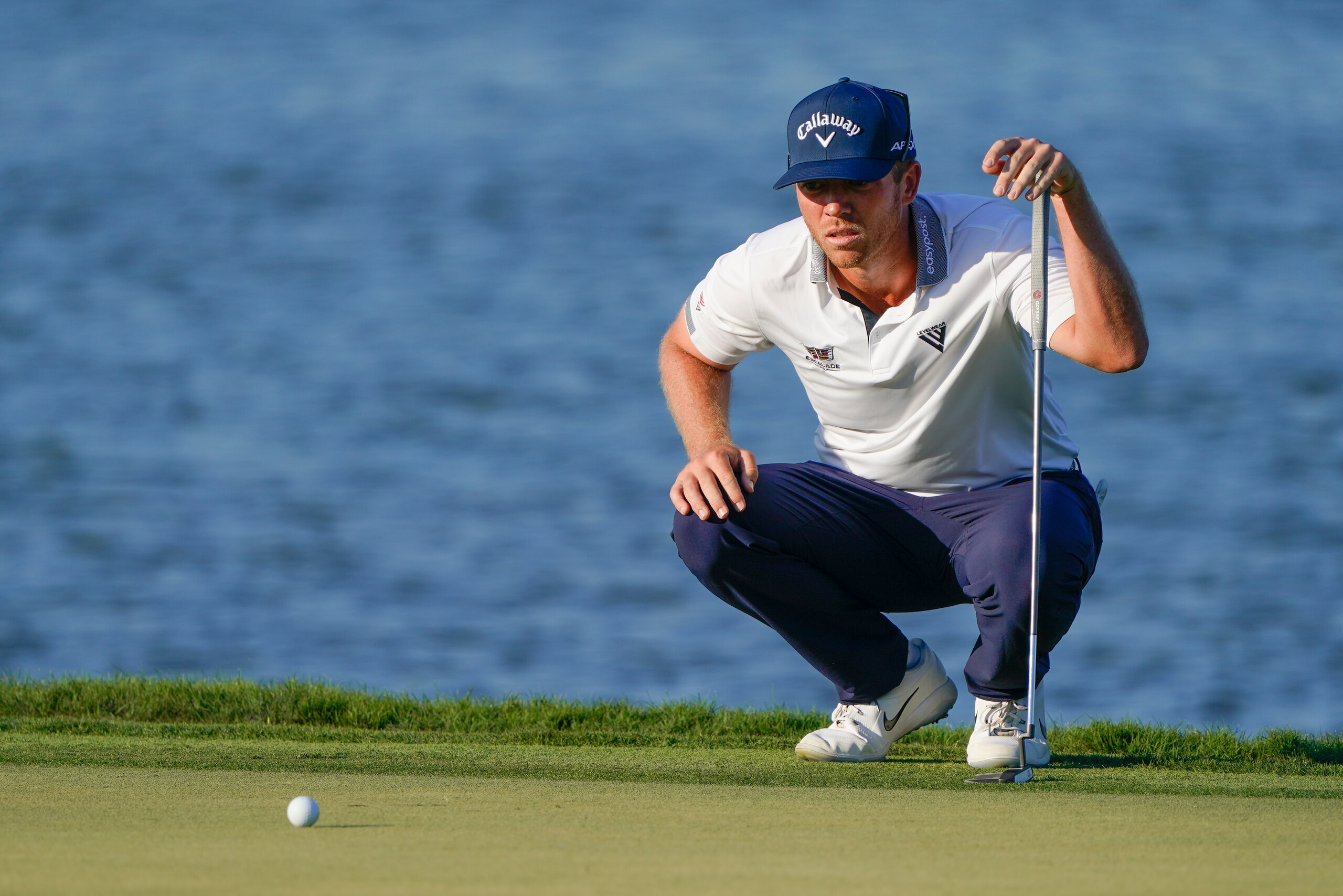 Talor Gooch lines up a putt on the sixth green during the second round of the Arnold Palmer Invitational golf tournament Friday, March 4, 2022, in Orlando, Fla. (AP Photo/John Raoux)