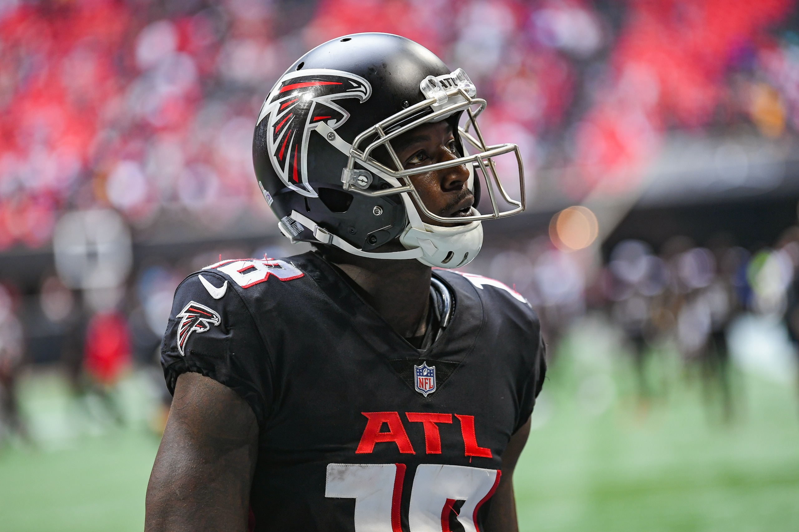 ATLANTA, GA  OCTOBER 03:  Atlanta wide receiver Calvin Ridley (18) looks into the crowd while walking off the field following the conclusion of the NFL game between the Washington Football Team and the Atlanta Falcons on October 3rd, 2021 at Mercedes-Benz Stadium in Atlanta, GA.  (Photo by Rich von Biberstein/Icon Sportswire via Getty Images)