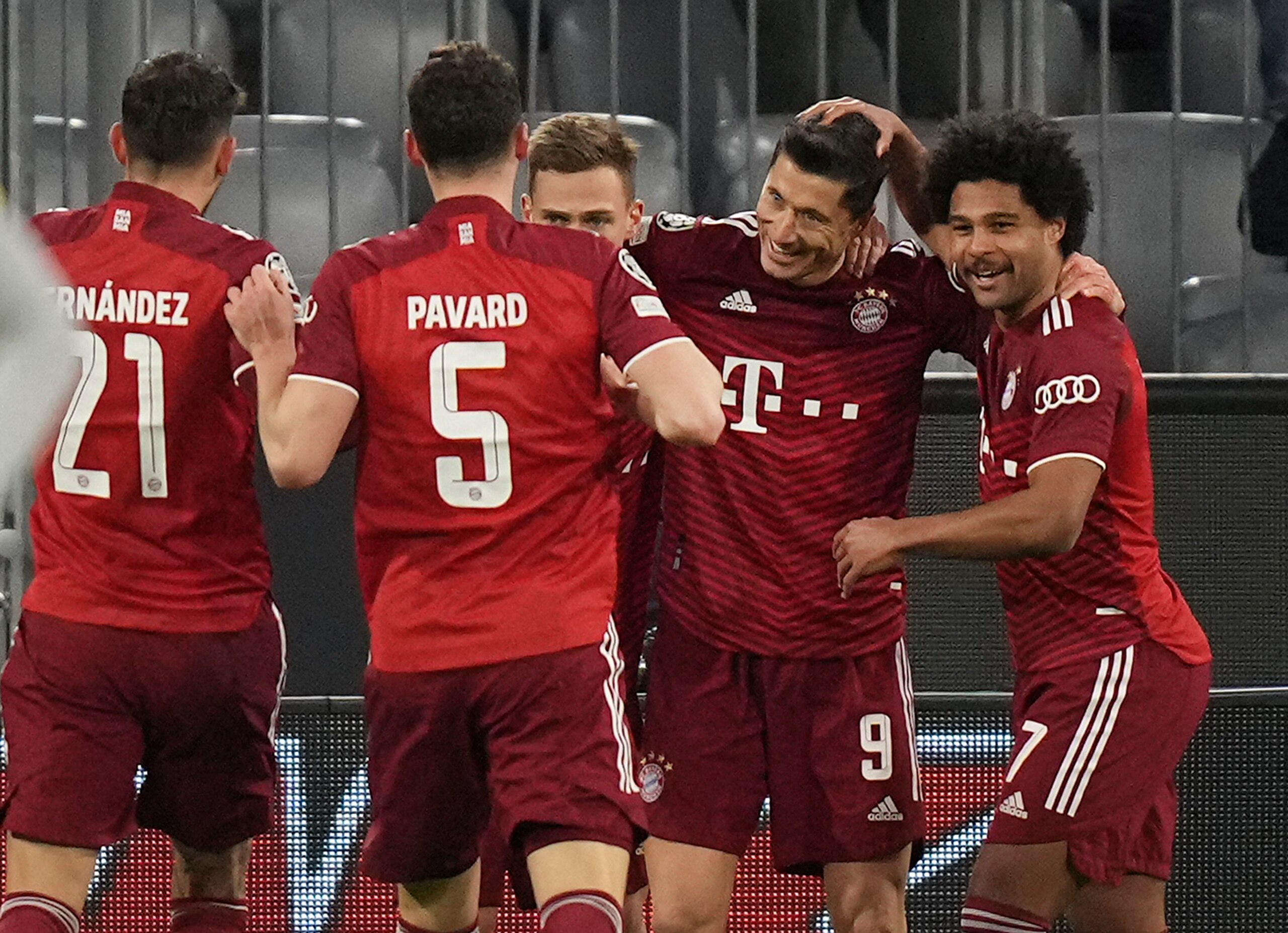 Bayern's Robert Lewandowski is celebrated after he scored his third goal during the Champions League, round of 16, second leg soccer match between Bayern and Salzburg in Munich, Germany, Tuesday, March 8, 2022. (AP Photo/Matthias Schrader)