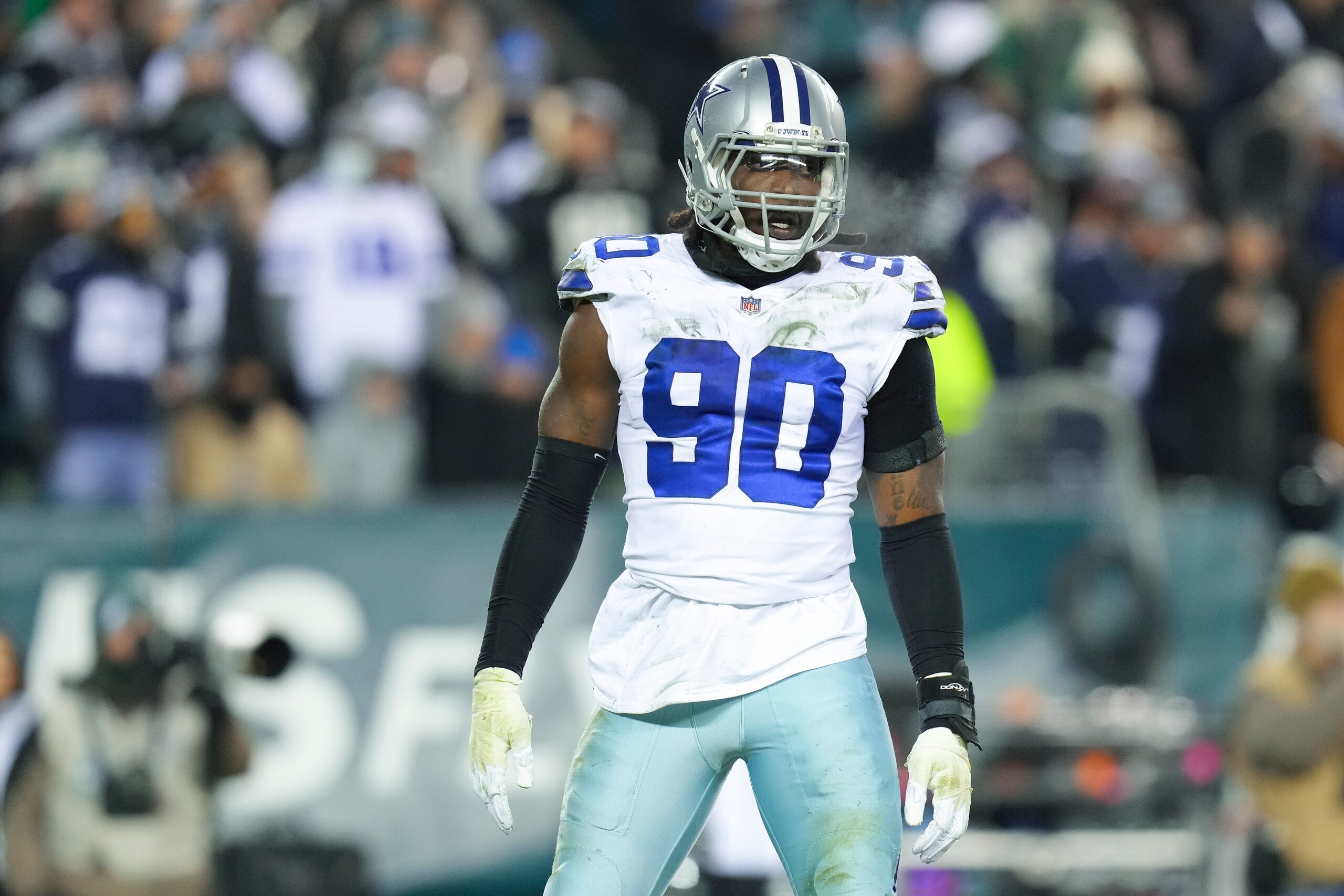 PHILADELPHIA, PA - JANUARY 08: Demarcus Lawrence #90 of the Dallas Cowboys looks on against the Philadelphia Eagles at Lincoln Financial Field on January 8, 2022 in Philadelphia, Pennsylvania. (Photo by Mitchell Leff/Getty Images) PHILADELPHIA, PA - JANUARY 08: Demarcus Lawrence #90 of the Dallas Cowboys looks on against the Philadelphia Eagles at Lincoln Financial Field on January 8, 2022 in Philadelphia, Pennsylvania. (Photo by Mitchell Leff/Getty Images)