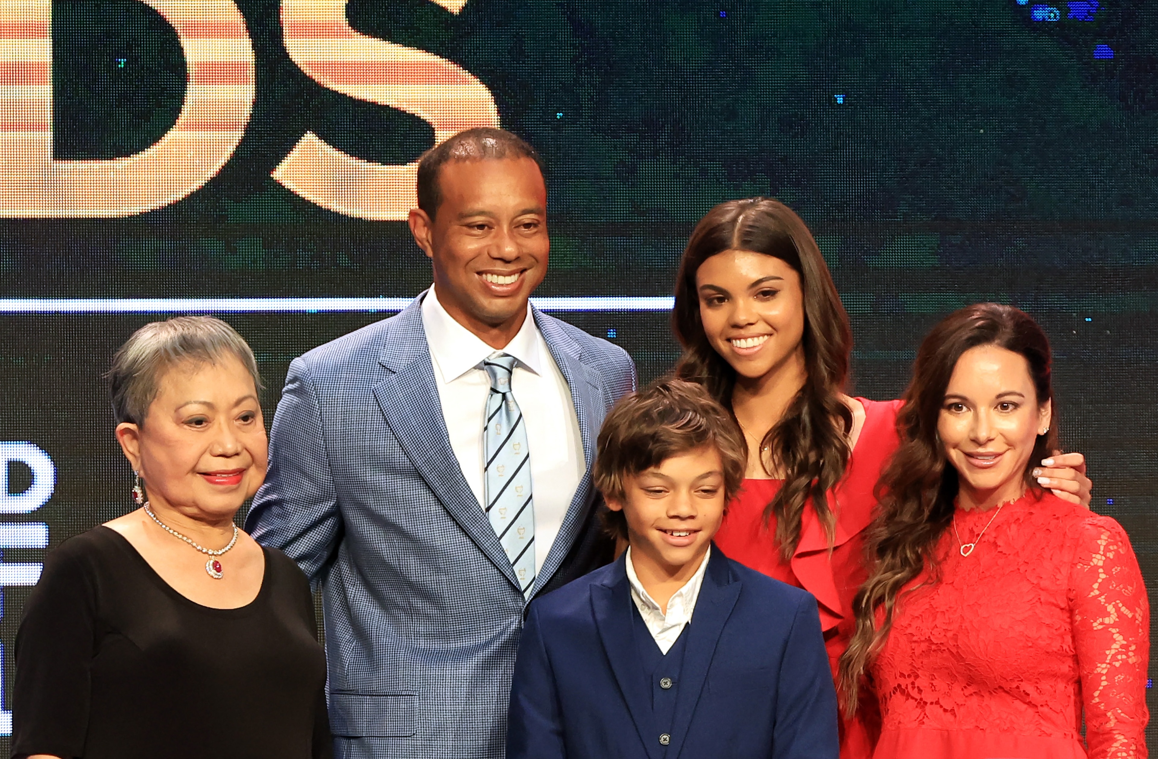 PONTE VEDRA BEACH, FLORIDA - MARCH 09: Tiger Woods, mother Kultida Woods (L), children Sam Alexis Woods and Charlie Axel Woods (C) and Erica Herman (R) pose for a photo prior to his induction at the 2022 World Golf Hall of Fame Induction at the PGA TOUR Global Home on March 09, 2022 in Ponte Vedra Beach, Florida. (Photo by Sam Greenwood/Getty Images)