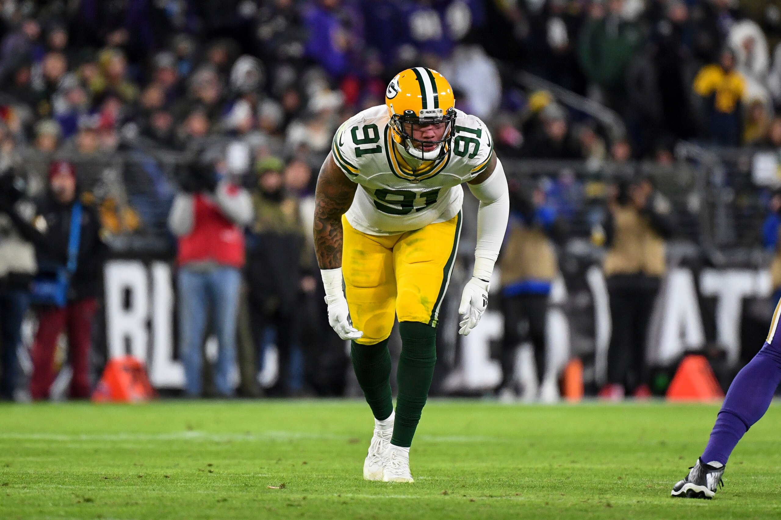 Green Bay Packers outside linebacker Preston Smith (91) in action during the second half of an NFL football game against the Baltimore Ravens, Sunday, Dec. 19, 2021, in Baltimore. (AP Photo/Terrance Williams)