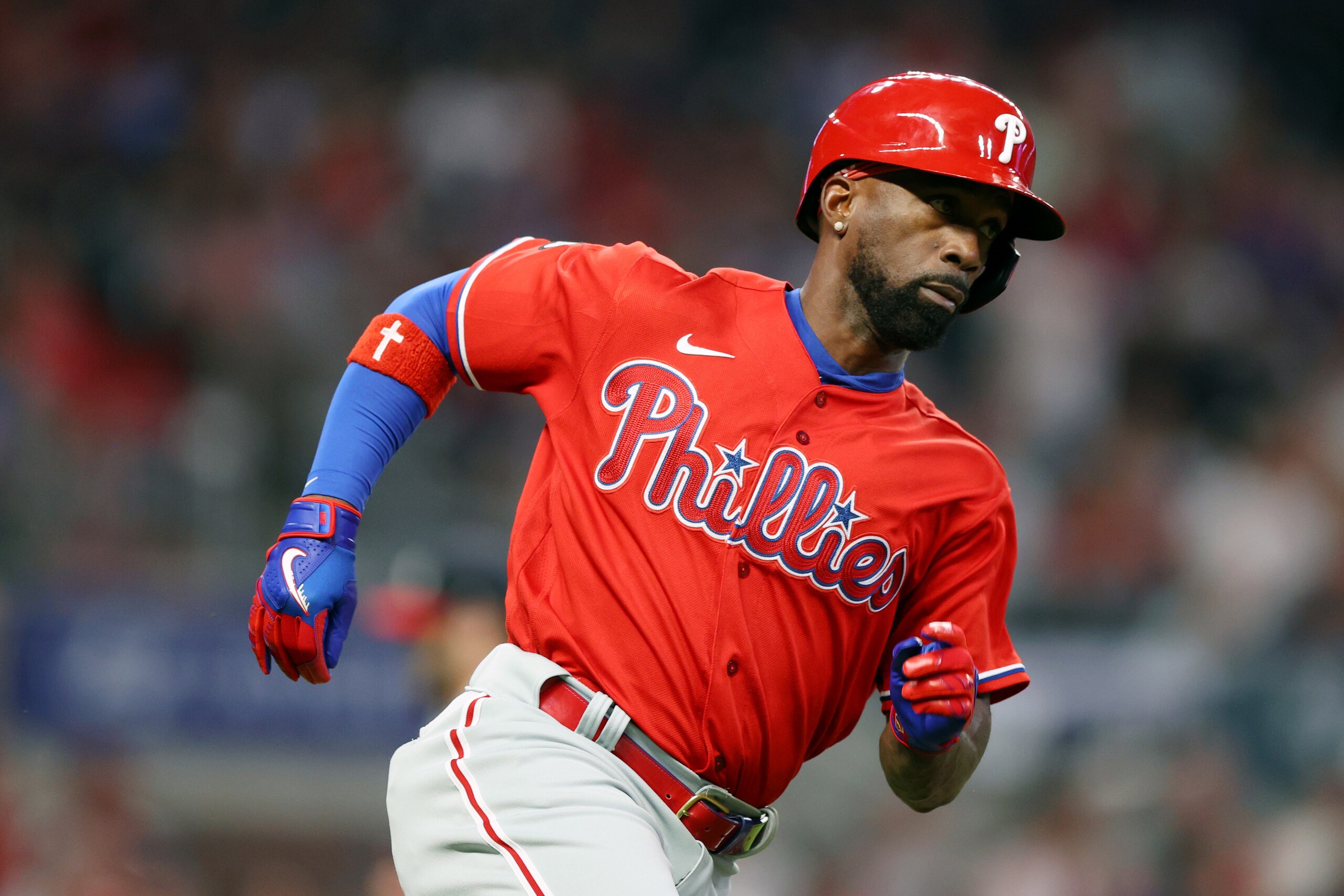ATLANTA, GA - SEPTEMBER 30:  Andrew McCutchen #22 of the Philadelphia Phillies runs to second base after hitting a double in the top of the second inning during the game between the Philadelphia Phillies and the Atlanta Braves at Truist Park on Thursday, September 30, 2021 in Atlanta, Georgia. (Photo by Todd Kirkland/MLB Photos via Getty Images)