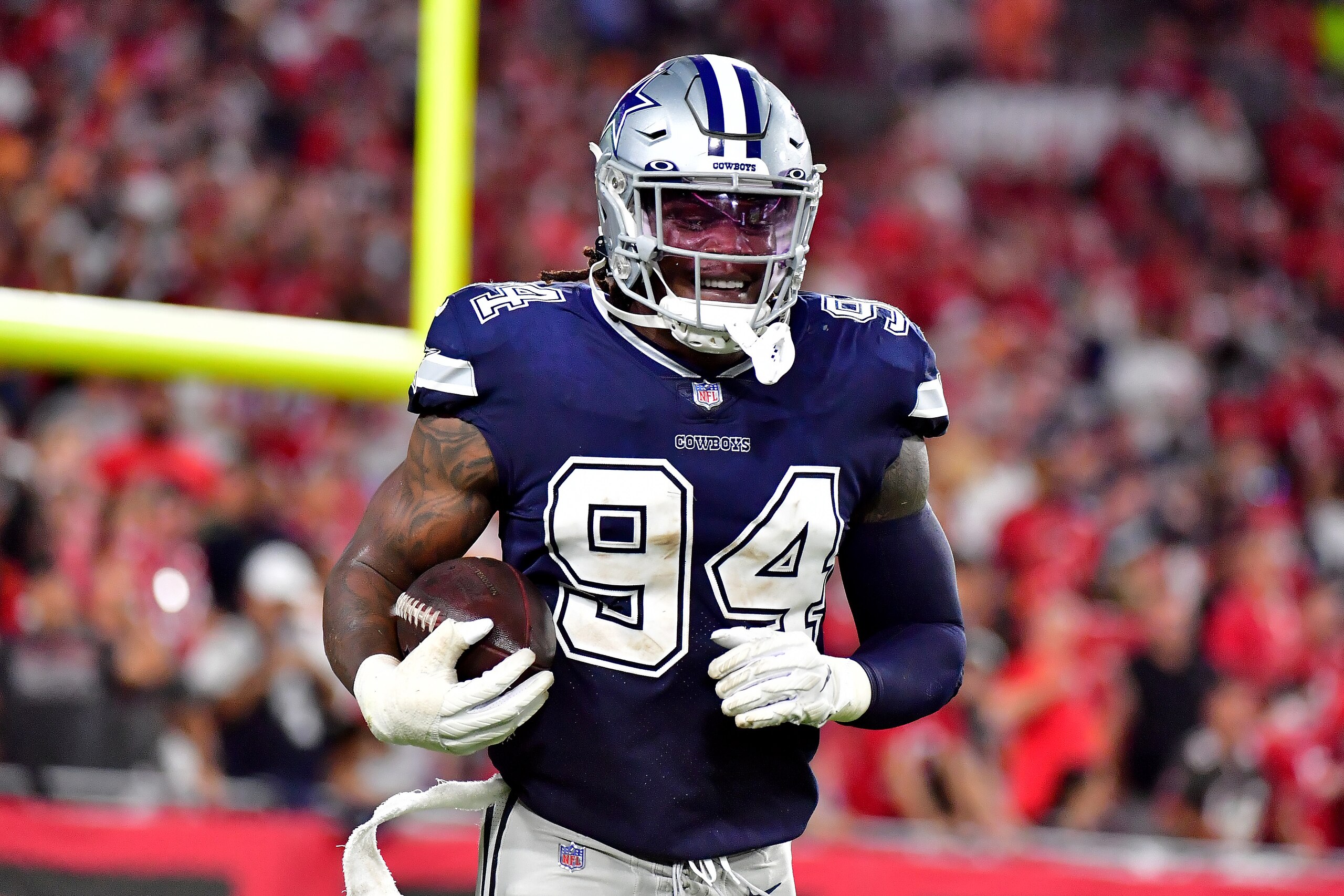 TAMPA, FLORIDA - SEPTEMBER 09: Randy Gregory #94 of the Dallas Cowboys reacts after a turnover against the Tampa Bay Buccaneers during the second quarter at Raymond James Stadium on September 09, 2021 in Tampa, Florida. (Photo by Julio Aguilar/Getty Images)