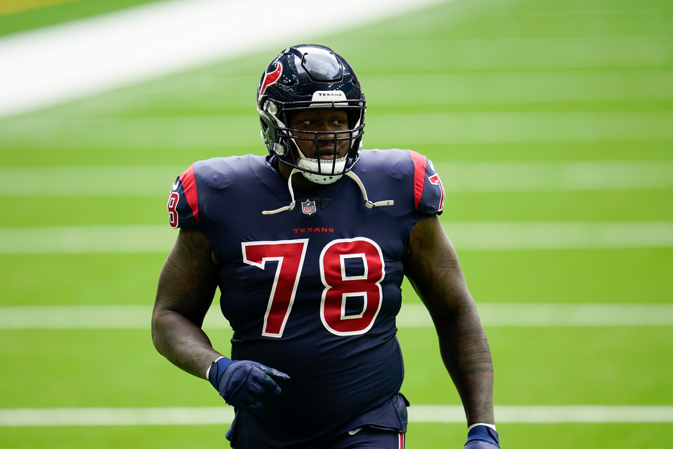 Houston Texans offensive lineman Laremy Tunsil (78) during pregame warmups before an NFL football game against the Cincinnati Bengals, Sunday, Dec. 27, 2020, in Houston. (AP Photo/Matt Patterson)
