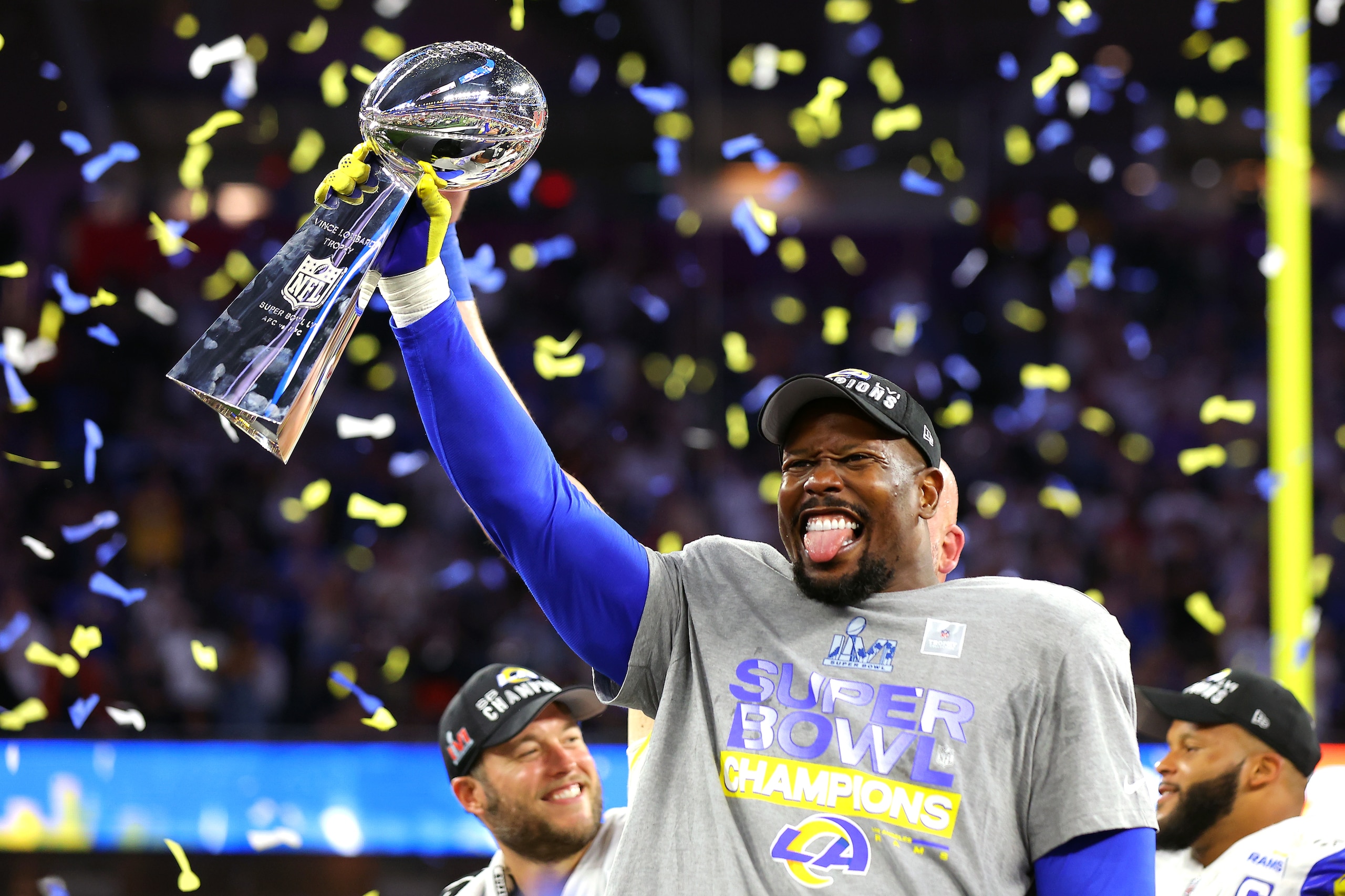 INGLEWOOD, CALIFORNIA - FEBRUARY 13: Von Miller #40 of the Los Angeles Rams holds up the Vince Lombardi Trophy  after Super Bowl LVI at SoFi Stadium on February 13, 2022 in Inglewood, California. The Los Angeles Rams defeated the Cincinnati Bengals 23-20.  (Photo by Kevin C. Cox/Getty Images)