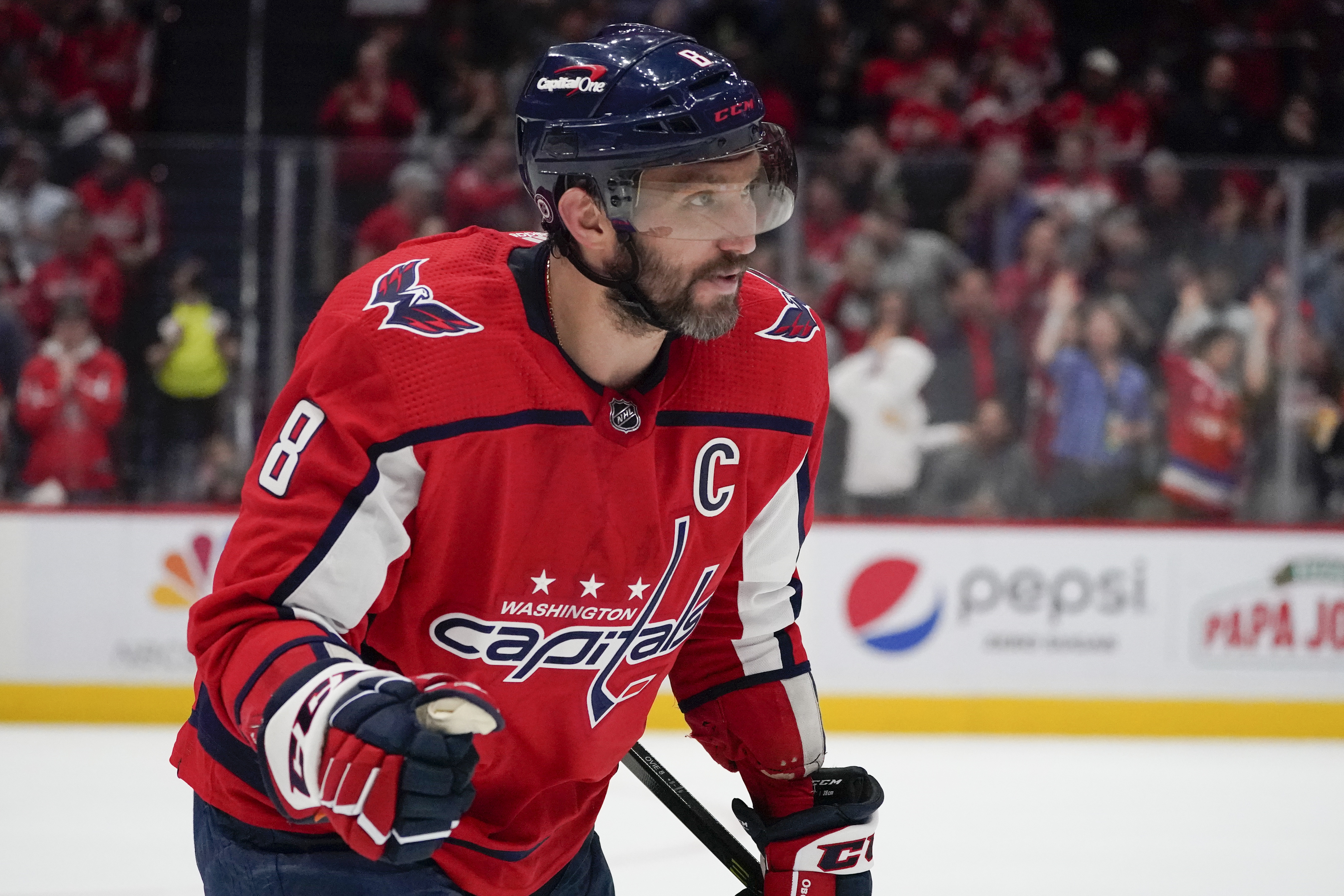 Washington Capitals left wing Alex Ovechkin heads to the bench on a line switch against the New York Islanders during the second period of an NHL hockey game, Tuesday, March 15, 2022, in Washington. (AP Photo/Julio Cortez)