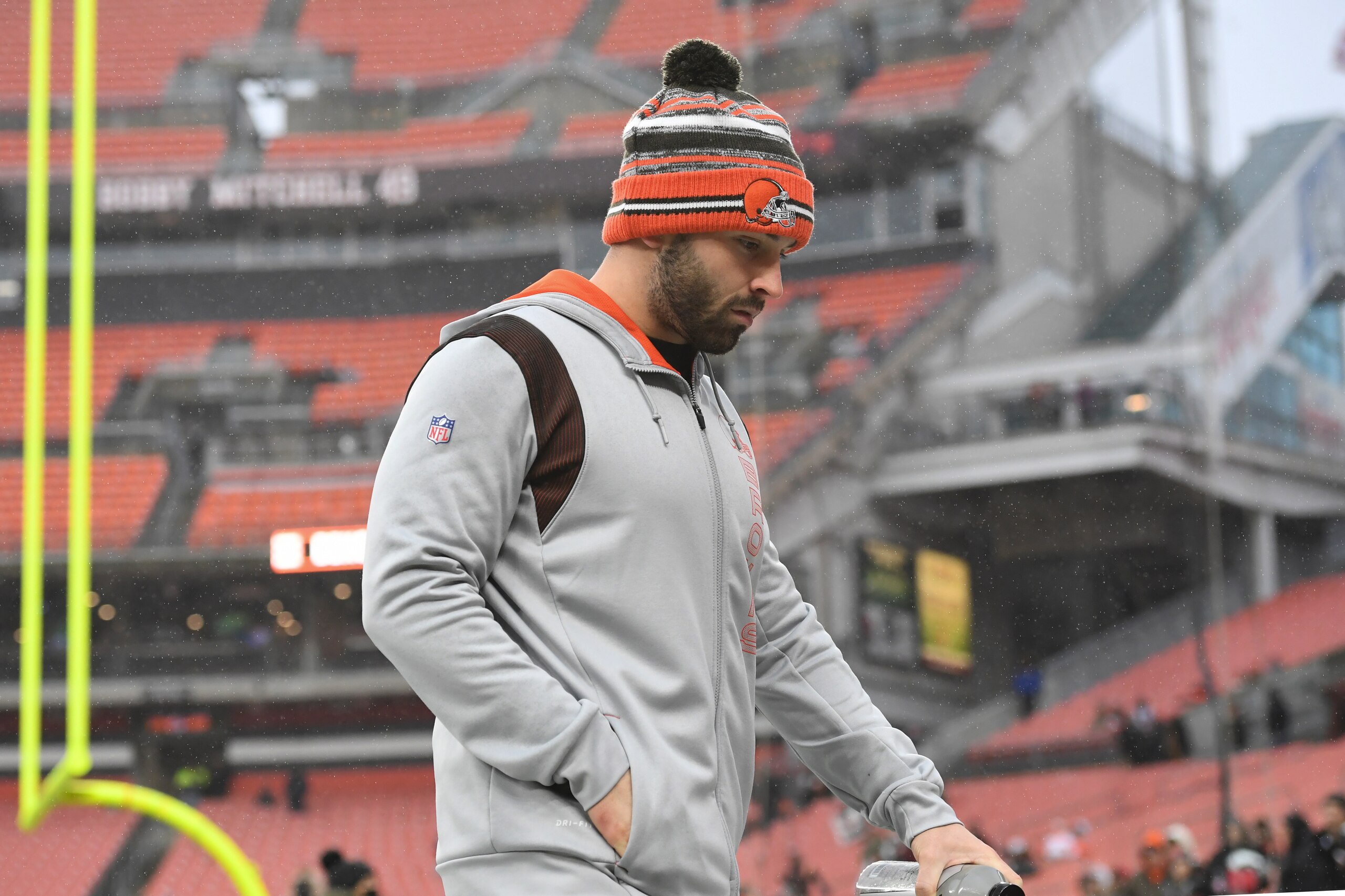 Cleveland Browns quarterback Baker Mayfield walks the field during warm-ups before an NFL football game against the Cincinnati Bengals, Sunday, Jan. 9, 2022, in Cleveland. (AP Photo/Nick Cammett)