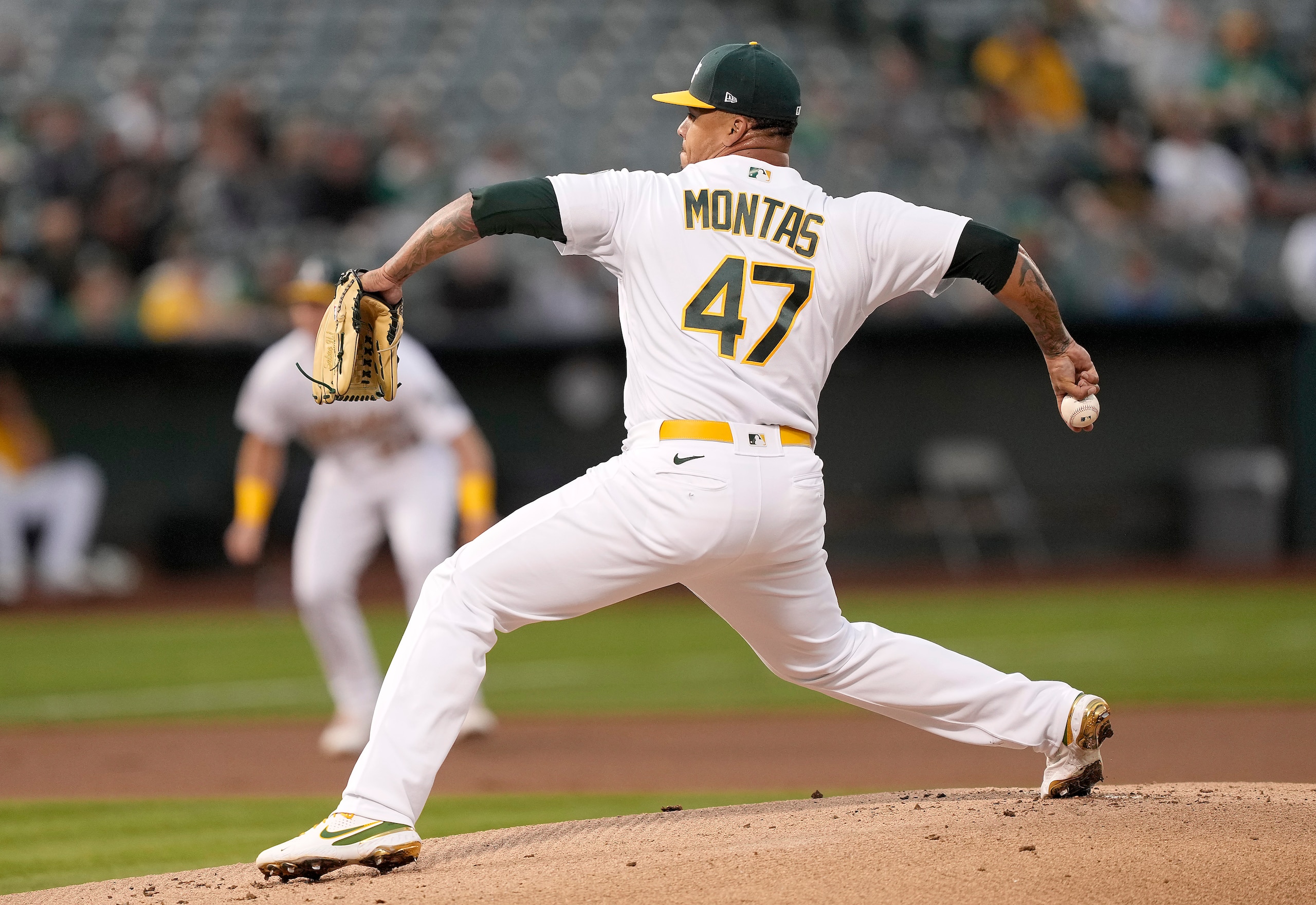 OAKLAND, CALIFORNIA - SEPTEMBER 24: Frankie Montas #47 of the Oakland Athletics pitches against the Houston Astros in the top of the first inning at RingCentral Coliseum on September 24, 2021 in Oakland, California. (Photo by Thearon W. Henderson/Getty Images)