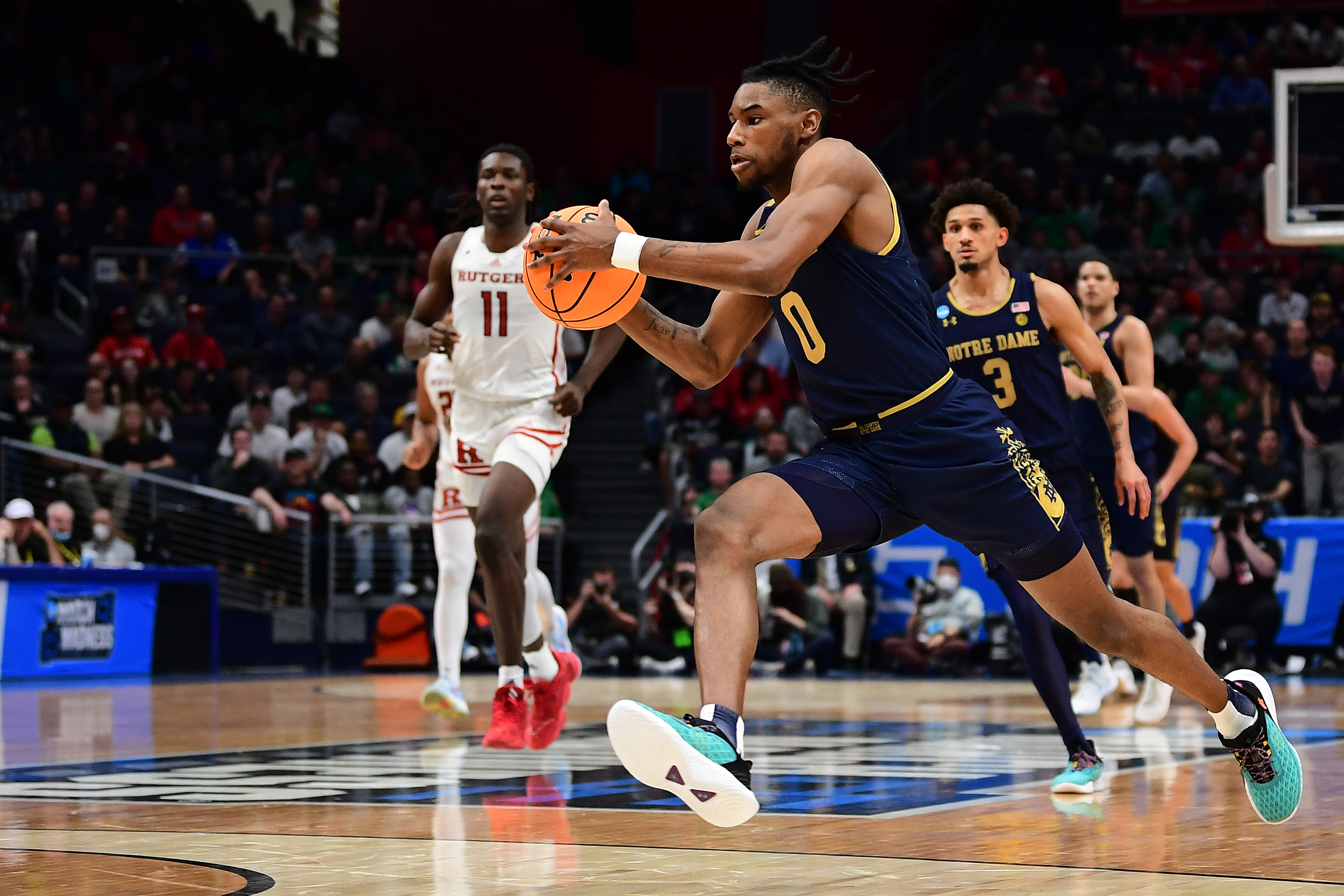 DAYTON, OHIO - MARCH 16: Blake Wesley #0 of the Notre Dame Fighting Irish drives with the ball in the second half of the game against the Rutgers Scarlet Knights during the First Four game of the 2022 NCAA Men's Basketball Tournament at UD Arena on March 16, 2022 in Dayton, Ohio. (Photo by Emilee Chinn/Getty Images)