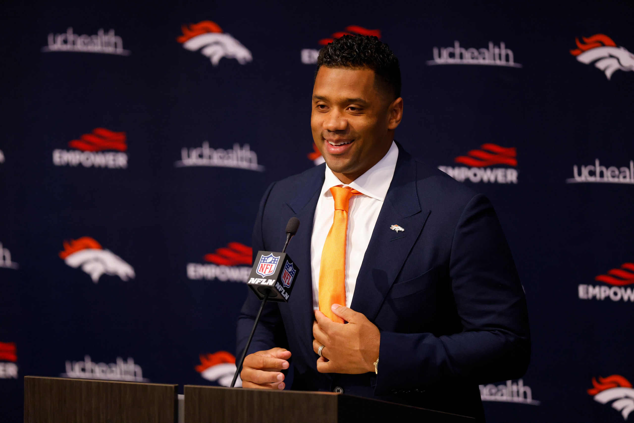 ENGLEWOOD, CO - MARCH 16:  Quarterback Russell Wilson #3 of the Denver Broncos addresses the press at UCHealth Training Center on March 16, 2022 in Englewood, Colorado. (Photo by Justin Edmonds/Getty Images)