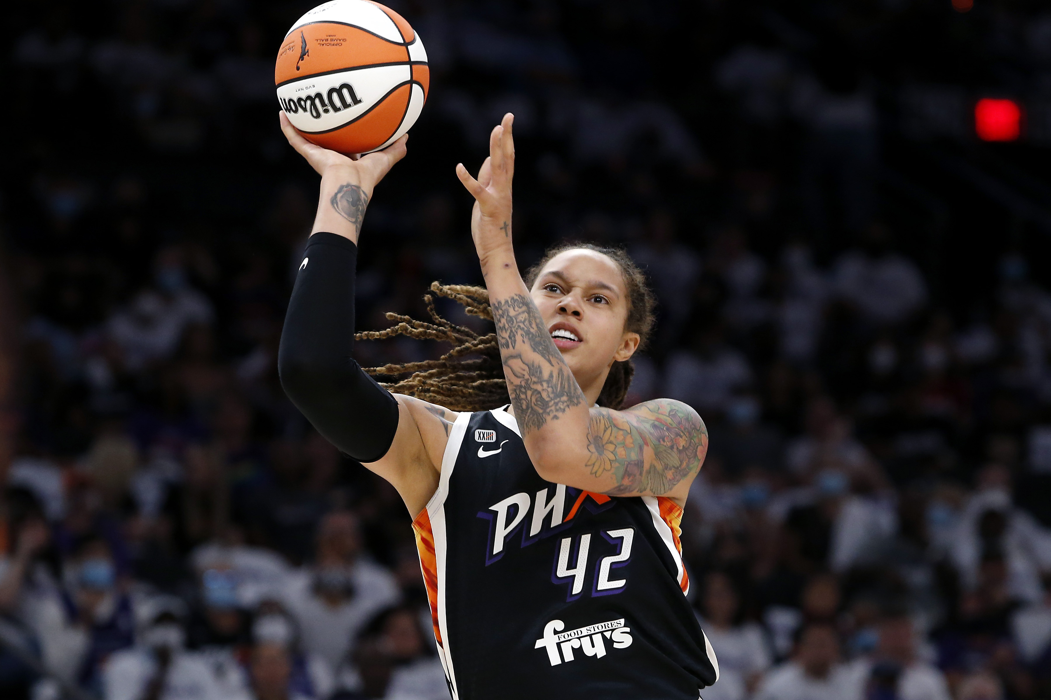 Phoenix Mercury center Brittney Griner (42) shoots against the Chicago Sky during the first half of Game 1 of the WNBA basketball Finals, Sunday, Oct. 10, 2021, in Phoenix. (AP Photo/Ralph Freso)