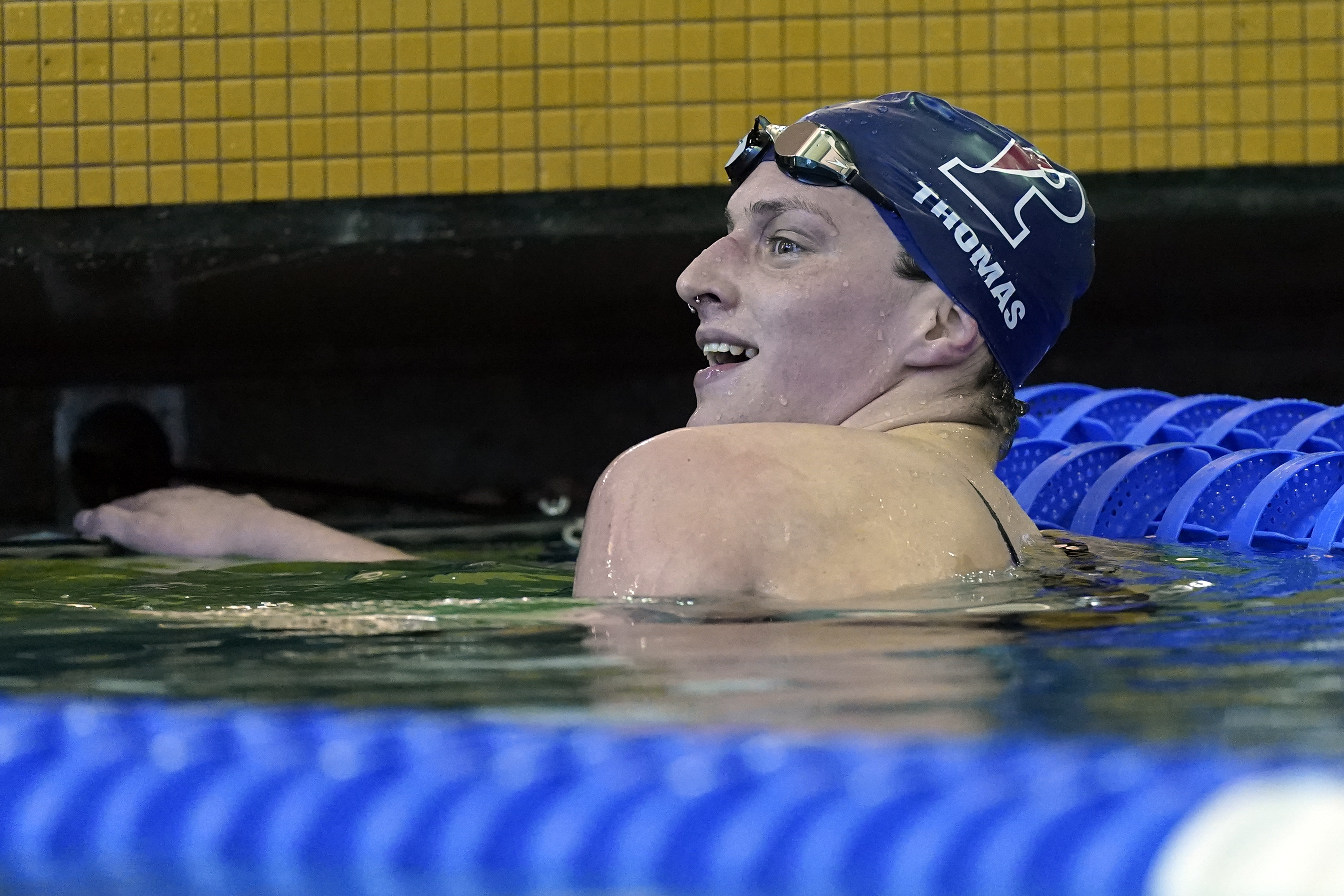 Pennsylvania's Lia Thomas smiles after winning a preliminary heat in the Women's NCAA 500 meter freestyle swimming championship start Thursday, March 17, 2022, in at Georgia Tech in Atlanta. (AP Photo/John Bazemore)