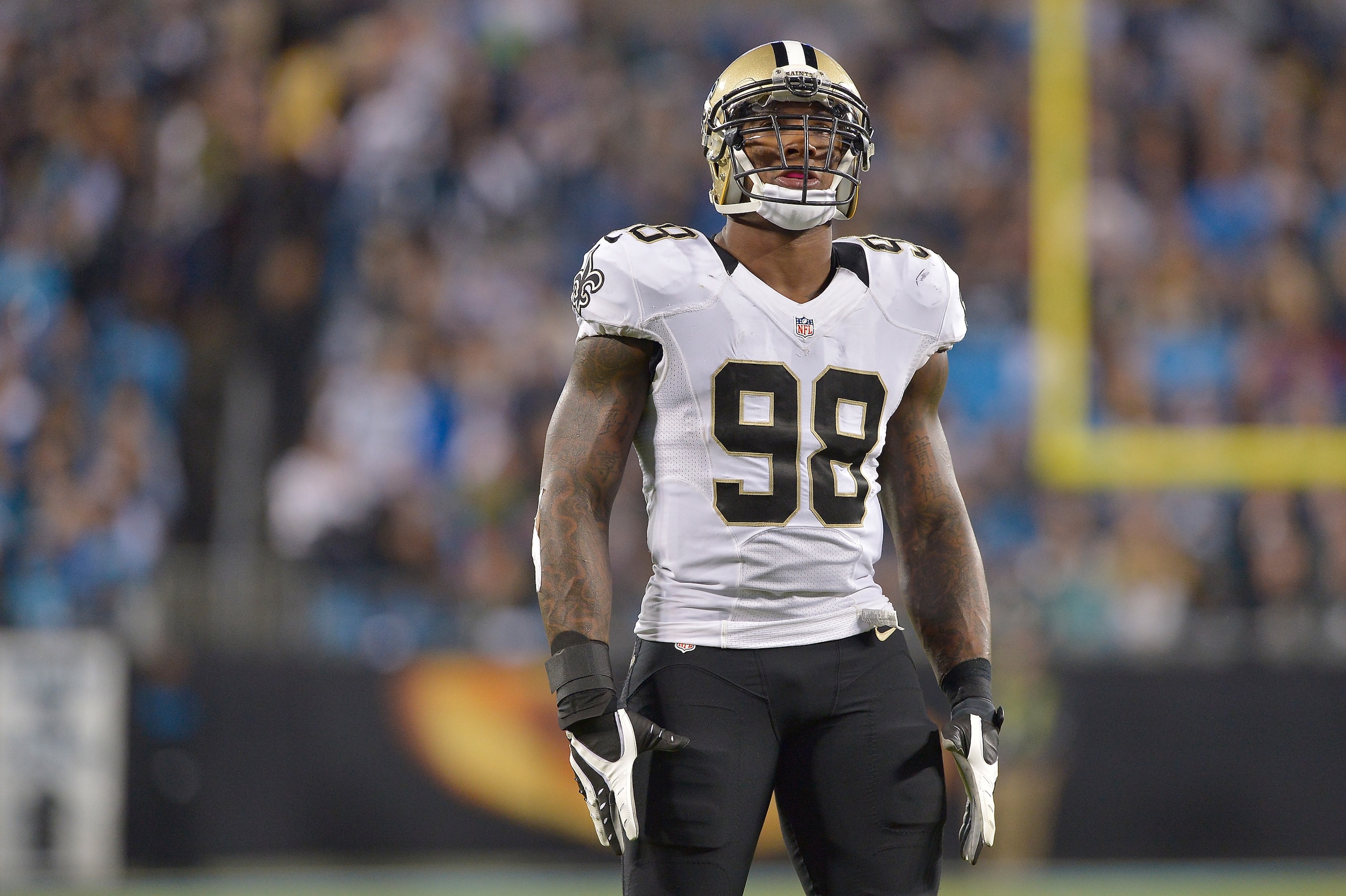 CHARLOTTE, NC - OCTOBER 30:  Parys Haralson #98 of the New Orleans Saints against the Carolina Panthers during their game at Bank of America Stadium on October 30, 2014 in Charlotte, North Carolina. The Saints won 28-10.  (Photo by Grant Halverson/Getty Images)