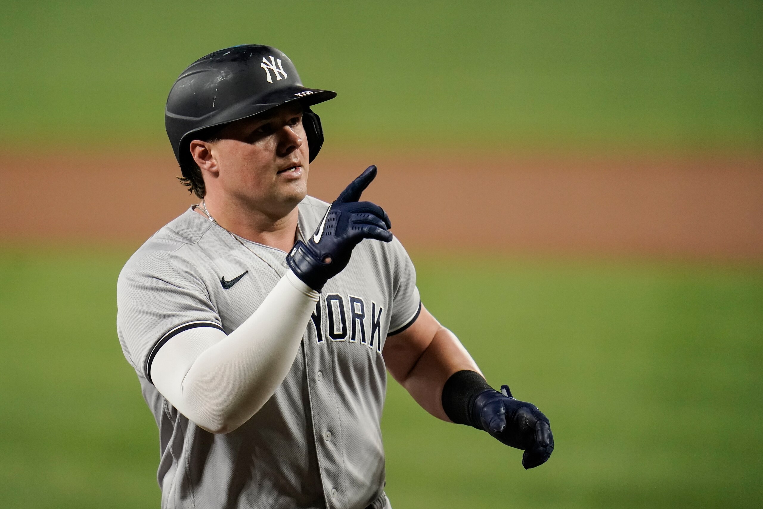 New York Yankees' Luke Voit gestures while running the bases after hitting a solo home run off Baltimore Orioles starting pitcher Alexander Wells during the third inning of a baseball game, Tuesday, Sept. 14, 2021, in Baltimore. (AP Photo/Julio Cortez)
