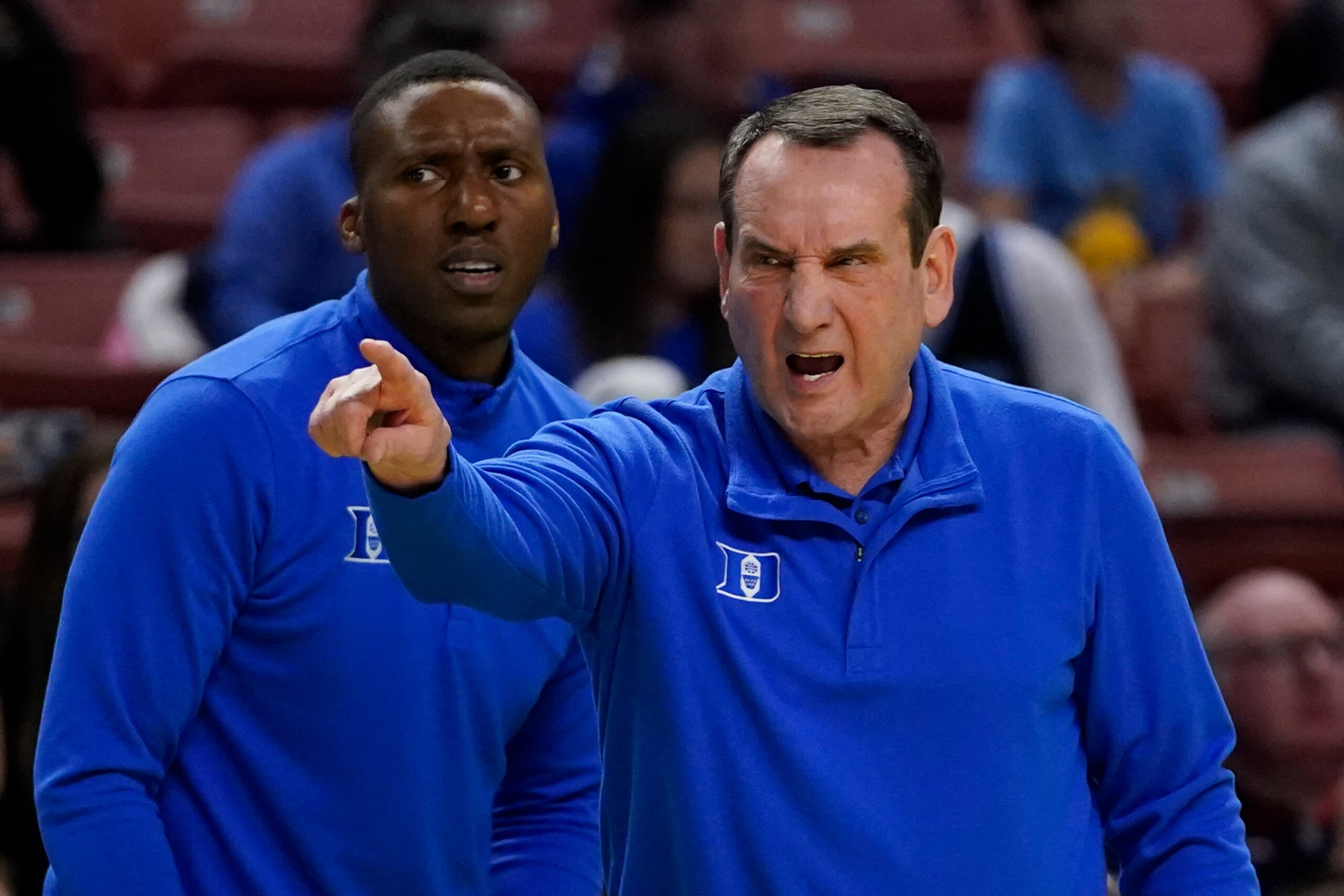 Duke head coach Mike Krzyzewski yells during the first half of a college basketball game against the Cal State Fullerton in the first round of the NCAA tournament on Friday, March 18, 2022, in Greenville, S.C. (AP Photo/Chris Carlson)