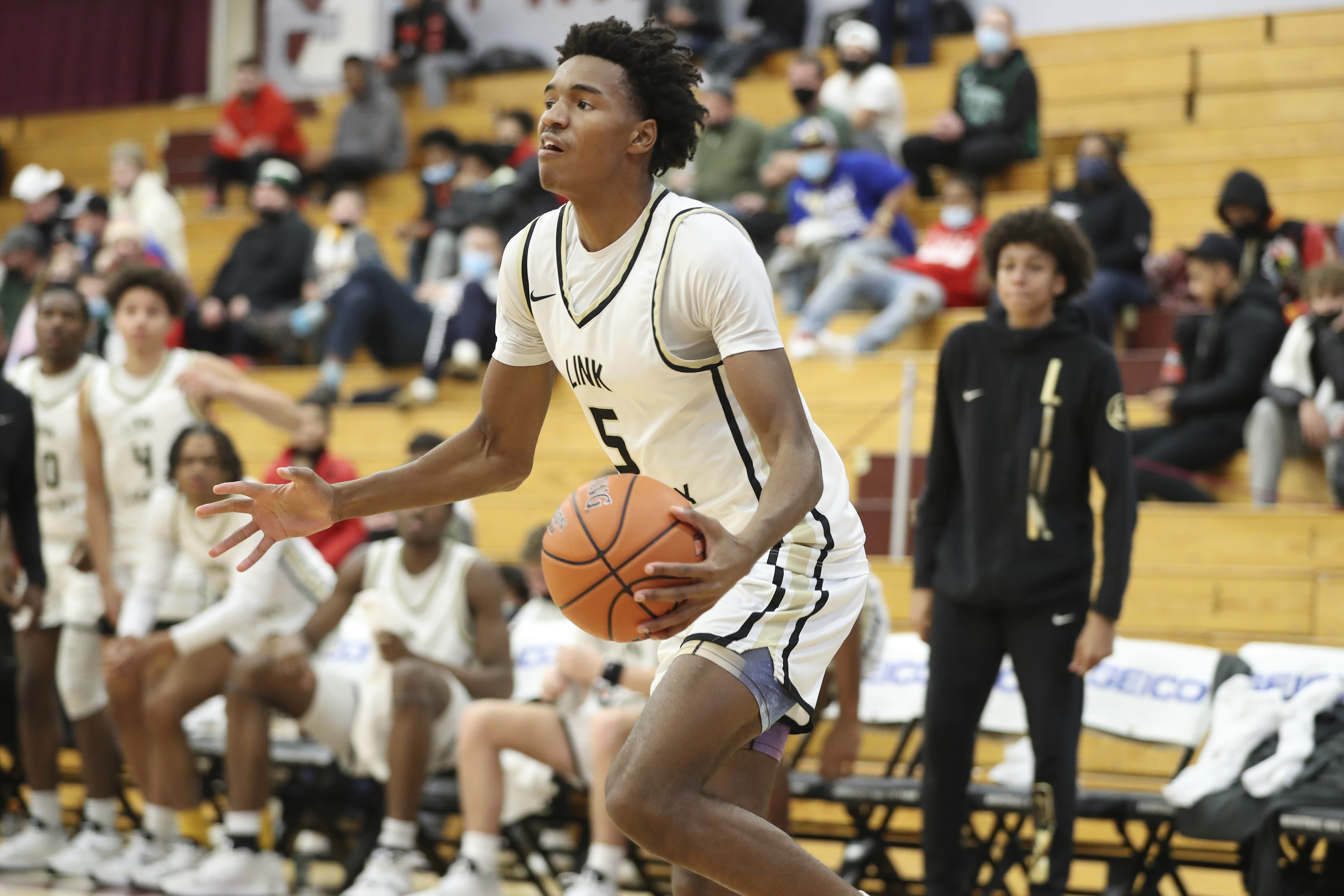 Link Academy's Julian Phillips #5 drives to the Basketball against Prolific Prep during a high school basketball game at the Hoophall Classic, Monday, January 17, 2022, in Springfield, MA. Link won the game. (AP Photo/Gregory Payan)