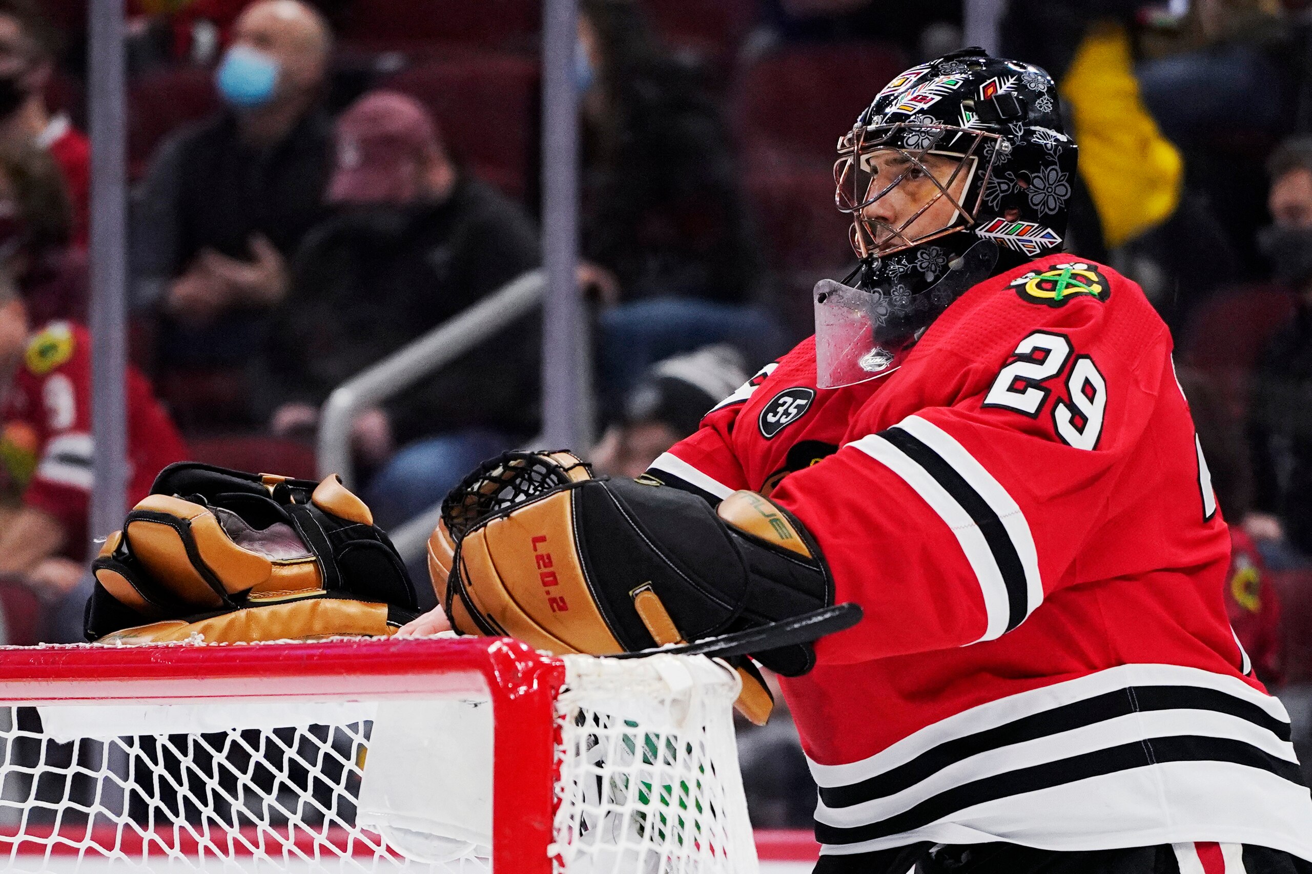 Chicago Blackhawks goaltender Marc-Andre Fleury looks at his teammates during the first period of an NHL hockey game against the Florida Panthers in Chicago, Sunday, Feb. 20, 2022. The Panthers won 5-2. (AP Photo/Nam Y. Huh)