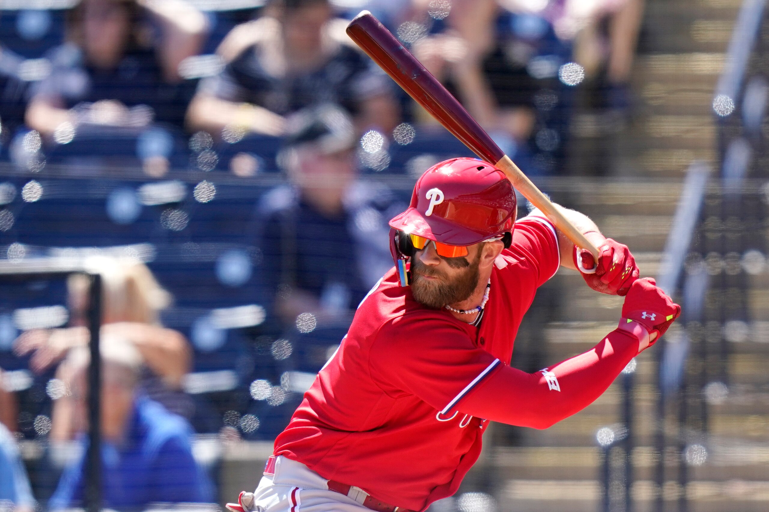Philadelphia Phillies' Bryce Harper bats during the first inning of a spring training baseball game against the New York Yankees, Monday, March 21, 2022, in Tampa, Fla. (AP Photo/Lynne Sladky)