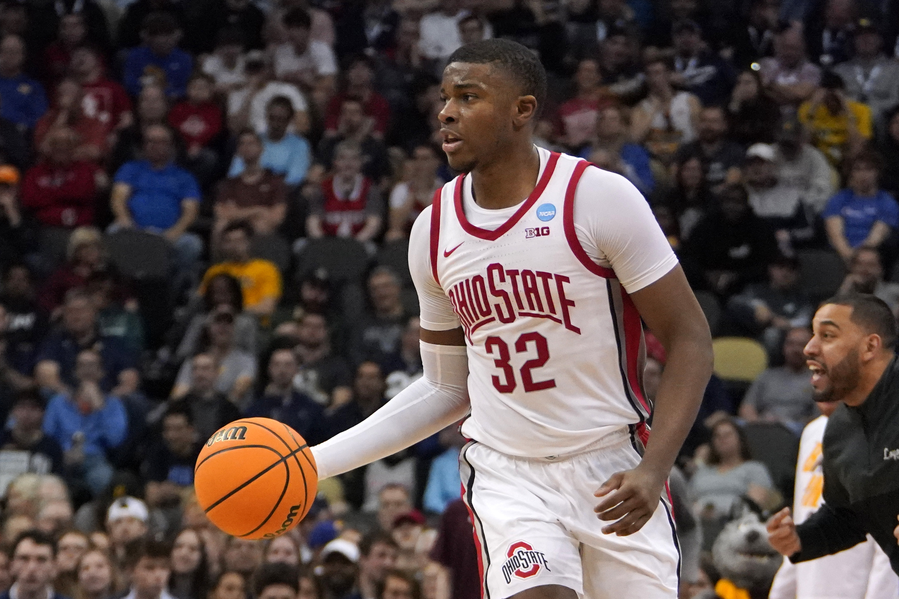 Ohio State 's E.J. Liddell (32) plays during the second half of a college basketball game Loyola Chicago in the first round of the NCAA tournament in Pittsburgh, Friday, March 18, 2022. Ohio State won 54-41. (AP Photo/Gene J. Puskar)