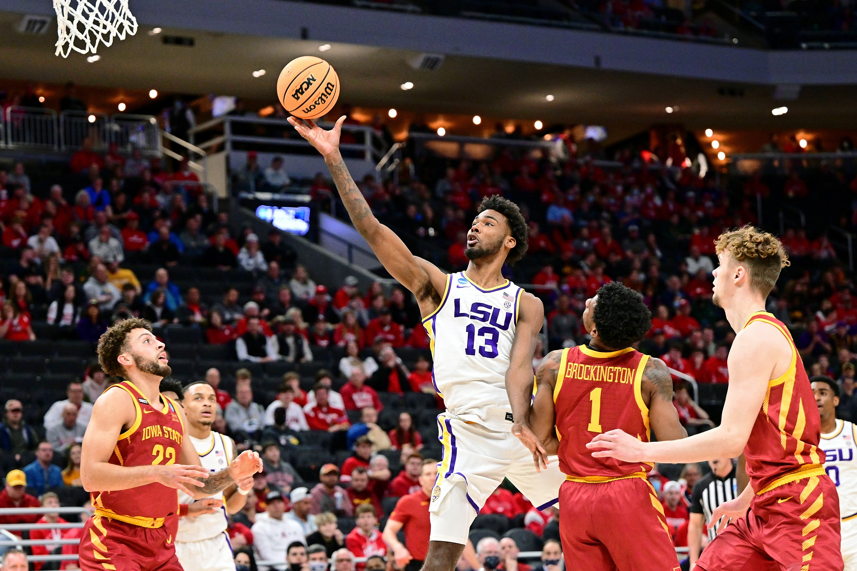 MILWAUKEE, WI - MARCH 18: Tari Eason #13 of the LSU Tigers shoots the ball against  Izaiah Brockington #1 of the Iowa State Cyclones during the first round of the 2022 NCAA Men's Basketball Tournament held at the Fiserv Forum on March 18, 2022 in Milwaukee, Wisconsin. (Photo by Ben Solomon/NCAA Photos via Getty Images)