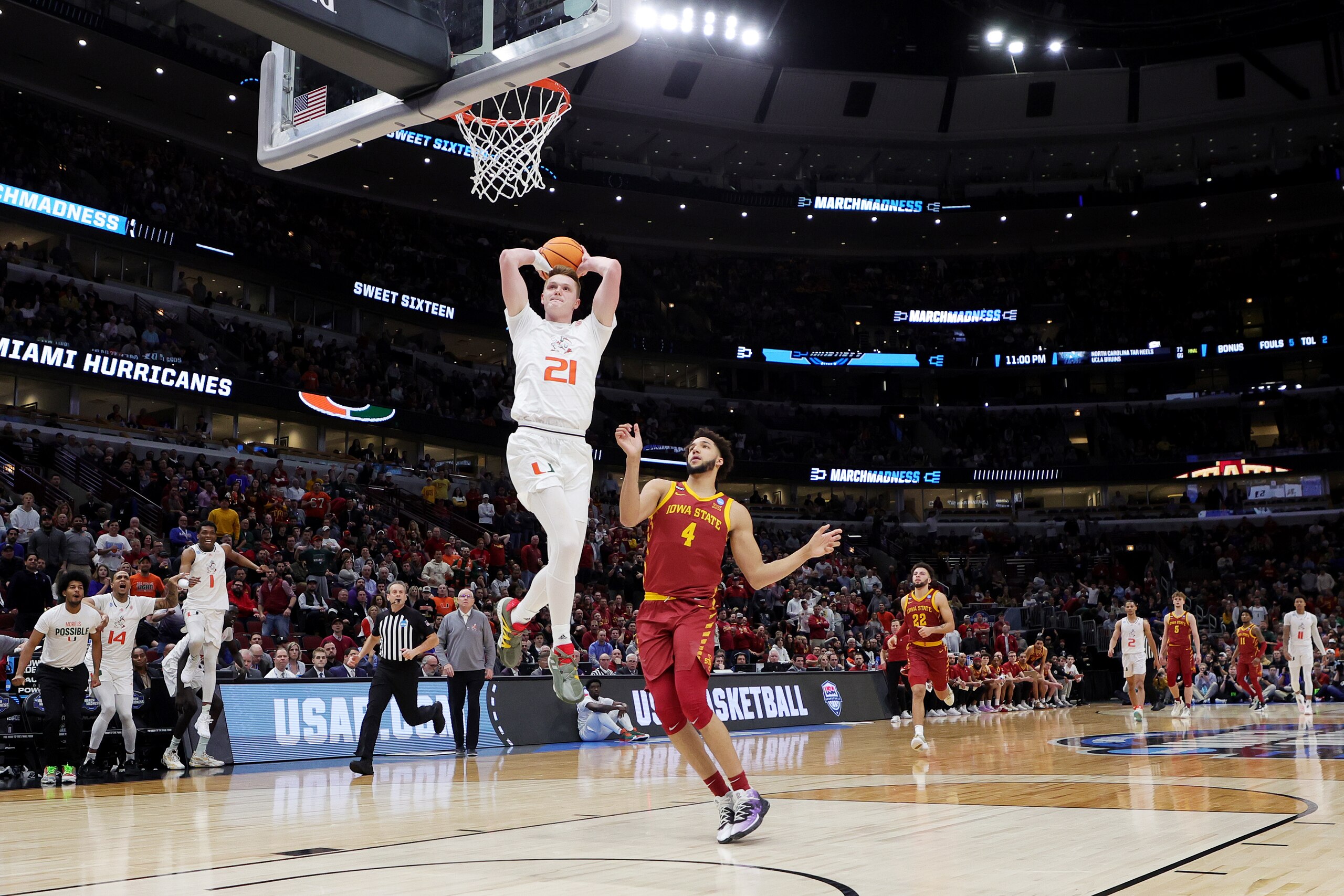 CHICAGO, ILLINOIS - MARCH 25: Sam Waardenburg #21 of the Miami Hurricanes dunks the ball against George Conditt IV #4 of the Iowa State Cyclones during the second half in the Sweet Sixteen round game of the 2022 NCAA Men's Basketball Tournament at United Center on March 25, 2022 in Chicago, Illinois. (Photo by Stacy Revere/Getty Images)