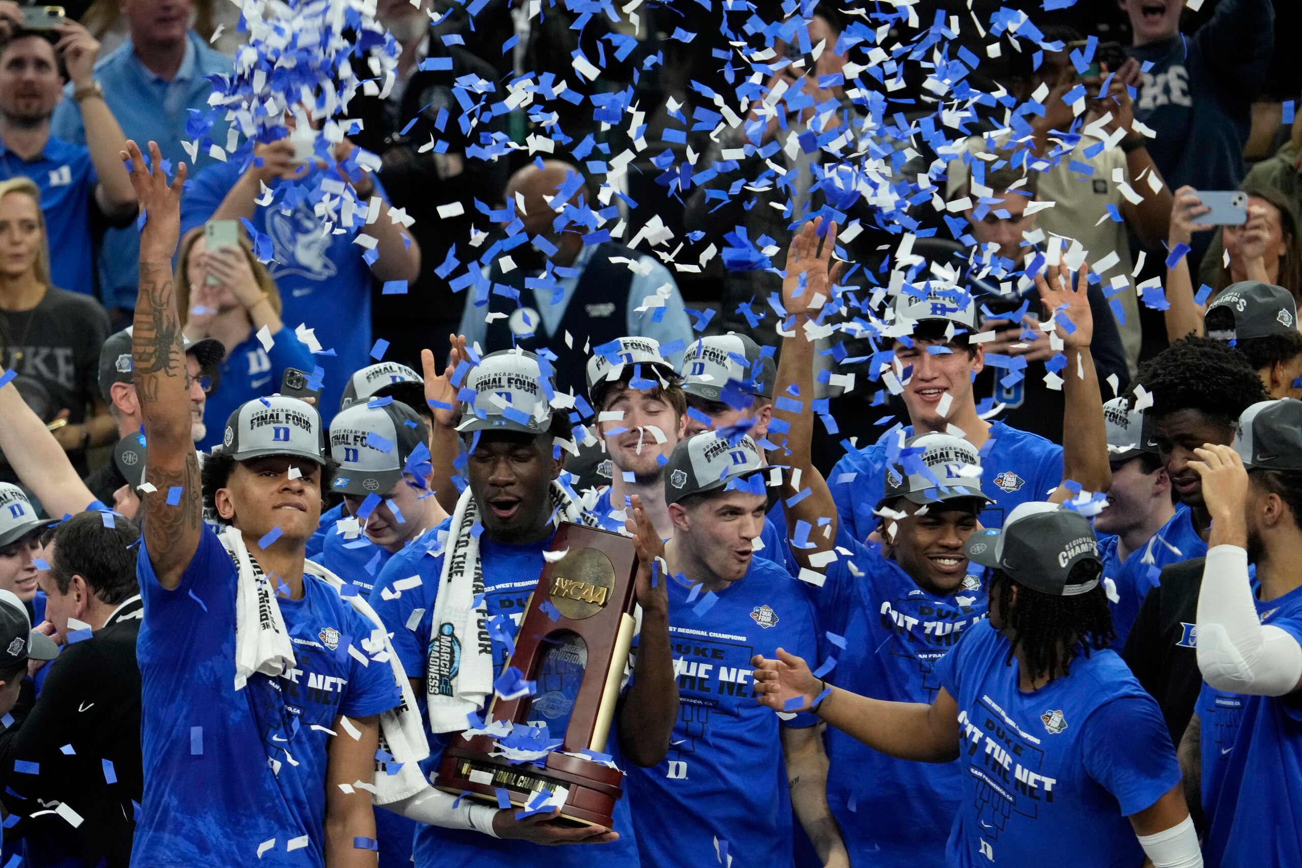 Duke players celebrate after defeating Arkansas in a college basketball game in the Elite 8 round of the NCAA men's tournament in San Francisco, Saturday, March 26, 2022. (AP Photo/Tony Avelar) Duke players celebrate after defeating Arkansas in a college basketball game in the Elite 8 round of the NCAA men's tournament in San Francisco, Saturday, March 26, 2022. (AP Photo/Tony Avelar)