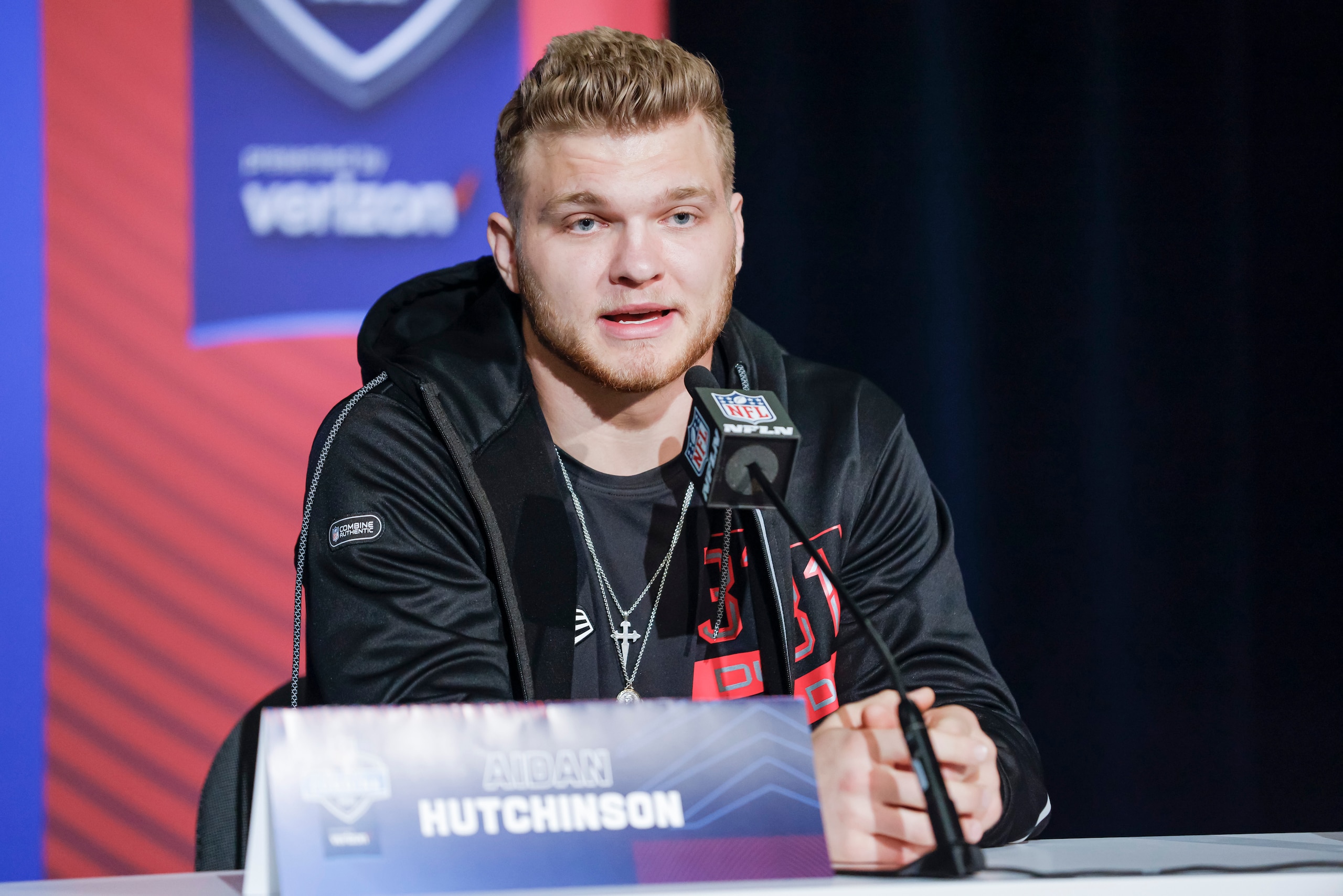 INDIANAPOLIS, IN - MAR 04: Aidan Hutchinson #DL31 of the Michigan Wolverines speaks to reporters during the NFL Draft Combine at the Indiana Convention Center on March 4, 2022 in Indianapolis, Indiana. (Photo by Michael Hickey/Getty Images)