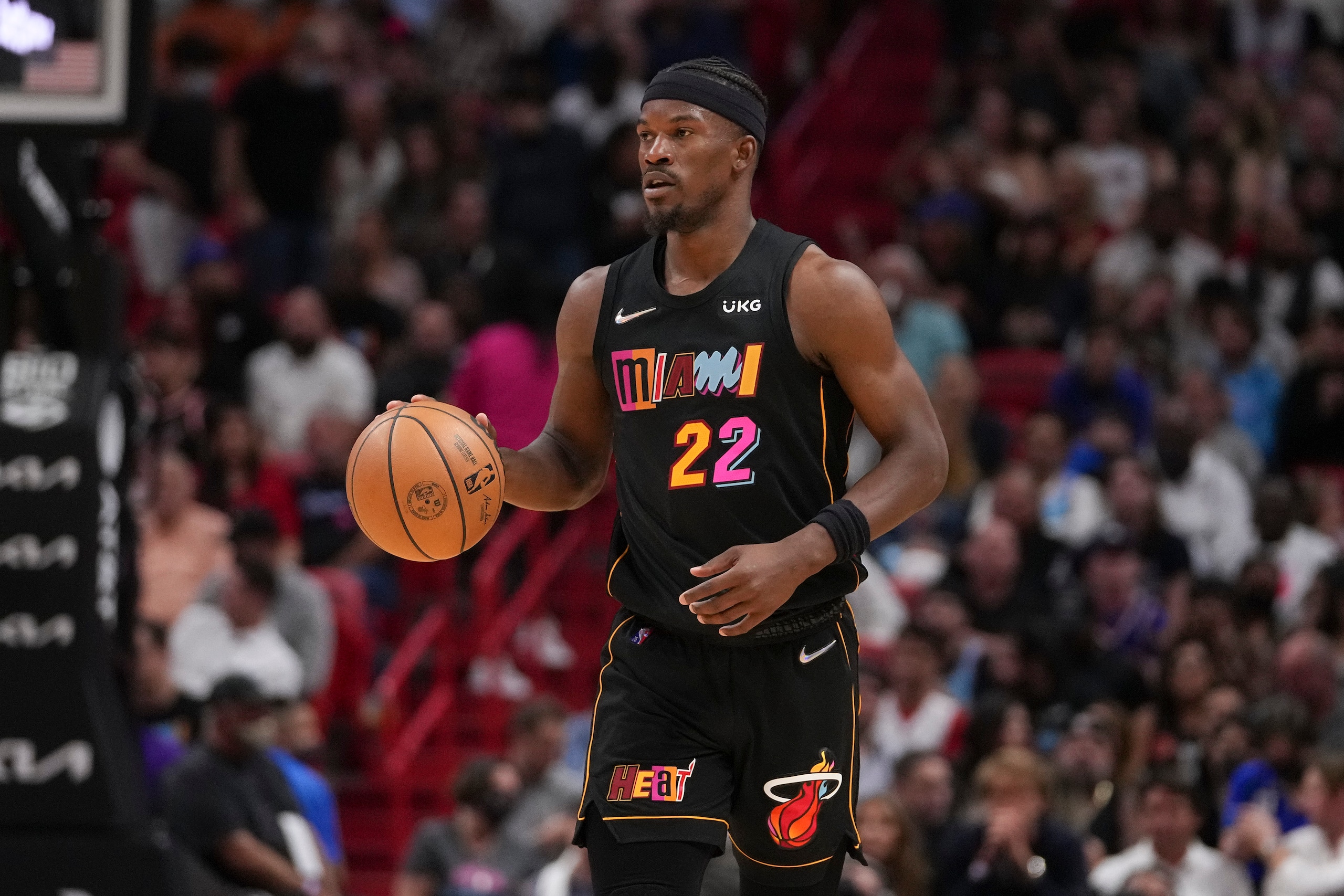 MIAMI, FLORIDA - MARCH 25: Jimmy Butler #22 of the Miami Heat brings the ball upcourt during the second half against the New York Knicks  at FTX Arena on March 25, 2022 in Miami, Florida.NOTE TO USER: User expressly acknowledges and agrees that,  by downloading and or using this photograph,  User is consenting to the terms and conditions of the Getty Images License Agreement. (Photo by Eric Espada/Getty Images)