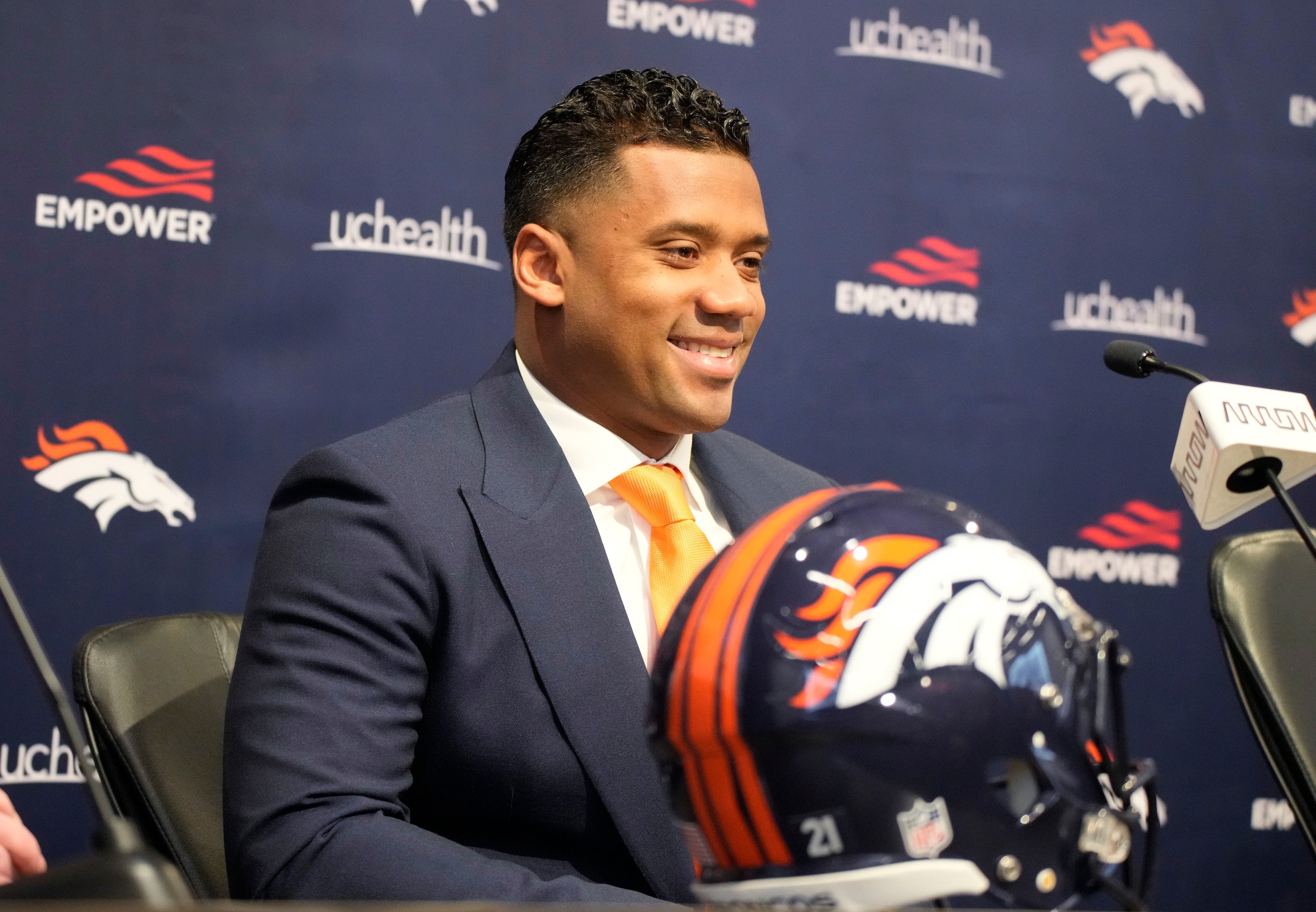 Denver Broncos new starting quarterback Russell Wilson speaks during a news conference Wednesday, March 16, 2022, at the team's headquarters in Englewood, Colo. (AP Photo/David Zalubowski) Denver Broncos new starting quarterback Russell Wilson speaks during a news conference Wednesday, March 16, 2022, at the team's headquarters in Englewood, Colo. (AP Photo/David Zalubowski)
