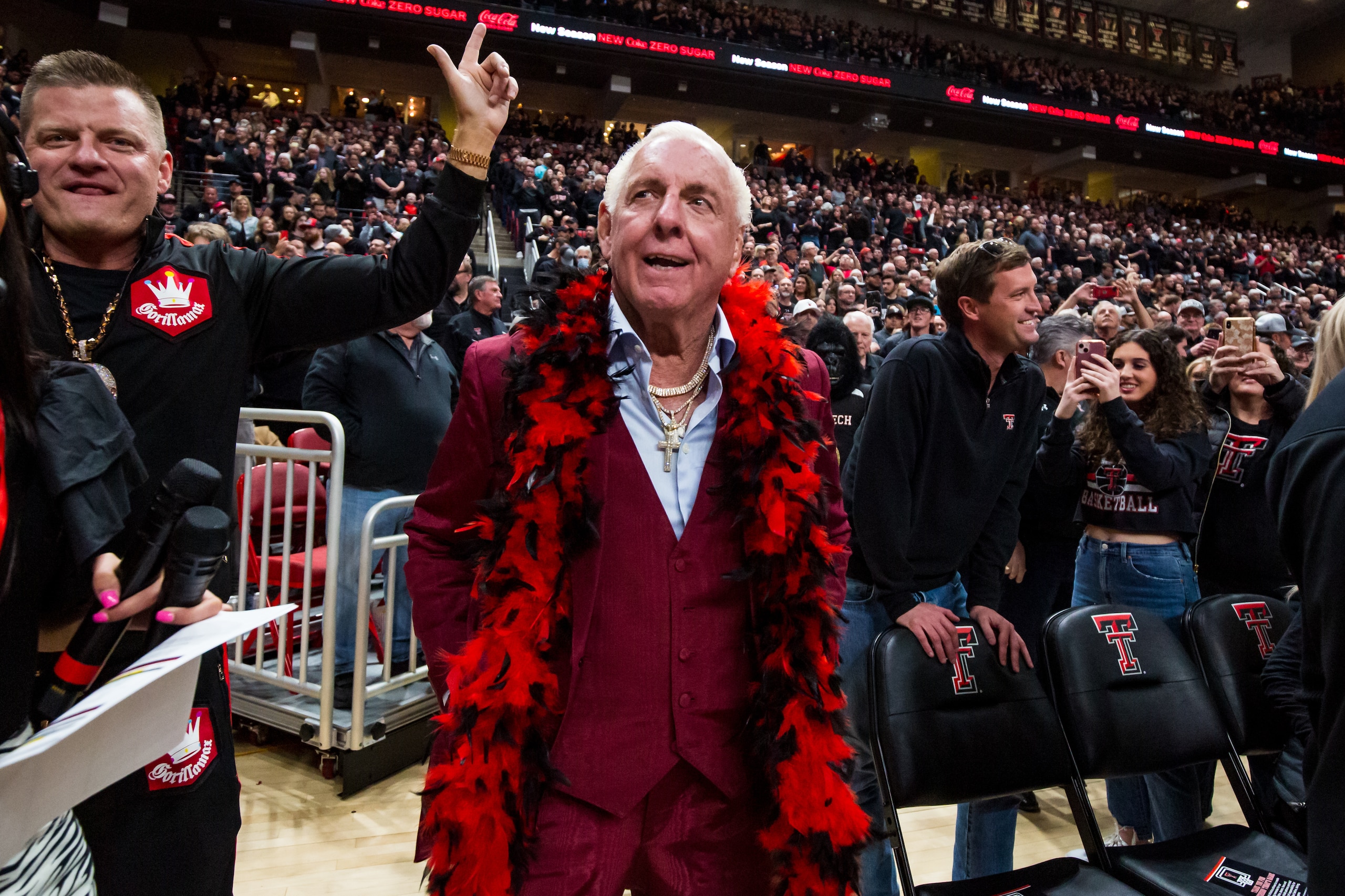 LUBBOCK, TEXAS - FEBRUARY 01: Former professional wrestler Ric Flair walks onto the court before the college basketball game between the Texas Tech Red Raiders and the Texas Longhorns at United Supermarkets Arena on February 01, 2022 in Lubbock, Texas. (Photo by John E. Moore III/Getty Images) LUBBOCK, TEXAS - FEBRUARY 01: Former professional wrestler Ric Flair walks onto the court before the college basketball game between the Texas Tech Red Raiders and the Texas Longhorns at United Supermarkets Arena on February 01, 2022 in Lubbock, Texas. (Photo by John E. Moore III/Getty Images)