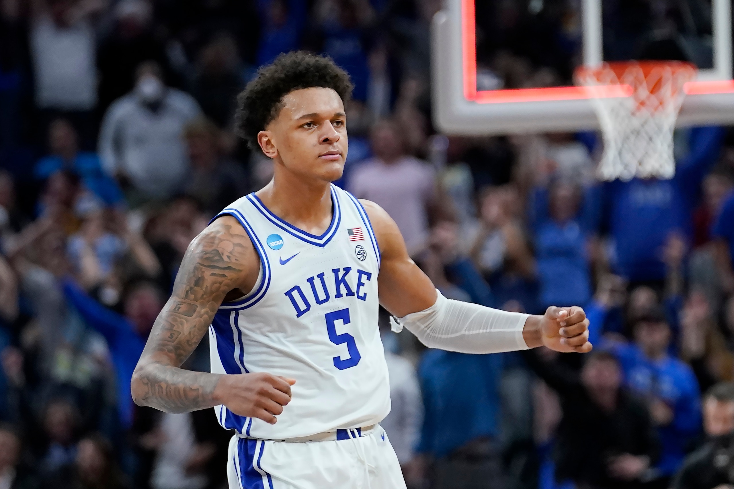 Duke forward Paolo Banchero (5) celebrates during the first half of a college basketball game against Arkansas in the Elite 8 round of the NCAA men's tournament in San Francisco, Saturday, March 26, 2022. (AP Photo/Marcio Jose Sanchez) Duke forward Paolo Banchero (5) celebrates during the first half of a college basketball game against Arkansas in the Elite 8 round of the NCAA men's tournament in San Francisco, Saturday, March 26, 2022. (AP Photo/Marcio Jose Sanchez)