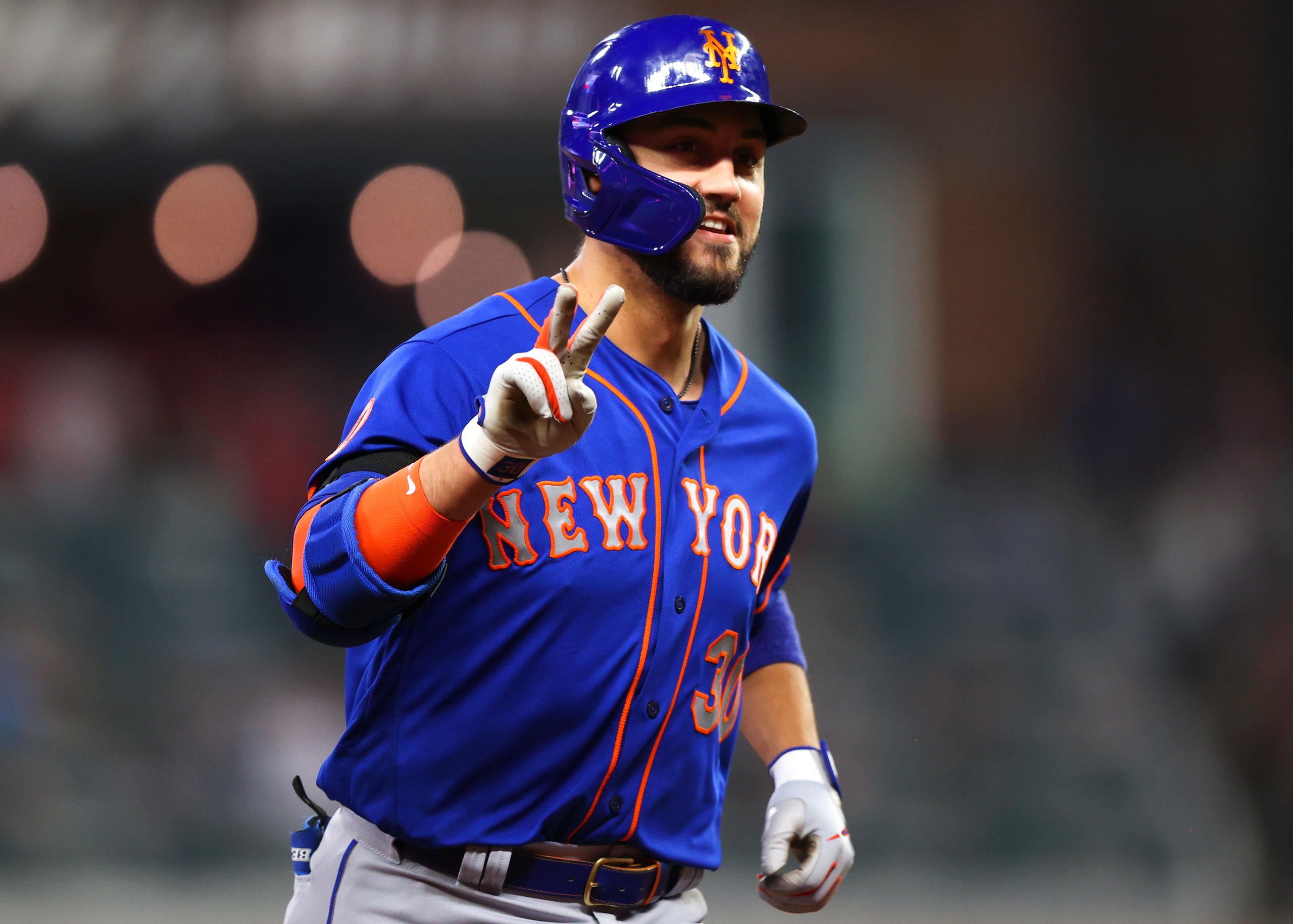 ATLANTA, GA - OCTOBER 02: Michael Conforto #30 of the New York Mets reacts after hitting a ball deep for a home run during the eighth inning of the game against the Atlanta Braves at Truist Park on October 2, 2021 in Atlanta, Georgia. (Photo by Todd Kirkland/Getty Images)