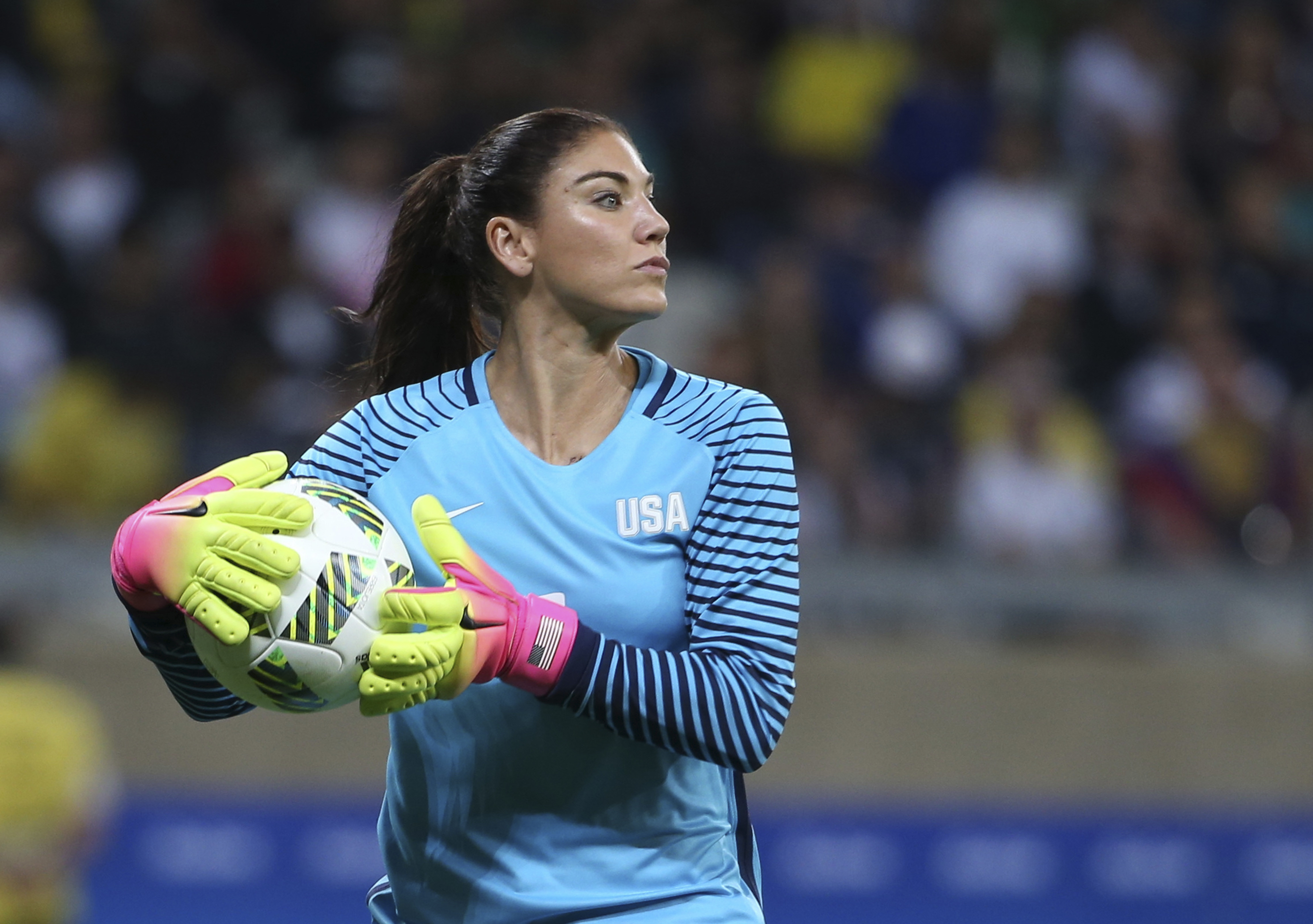 FILE - In this Aug. 3, 2016, file photo, United States' goalkeeper Hope Solo takes the ball during a women's soccer game at the Rio Olympics against New Zealand in Belo Horizonte, Brazil. Th suspended U.S. national team goalkeeper said Wednesday, Sept. 28, 2016, she has had shoulder replacement surgery. (AP Photo/Eugenio Savio, File)