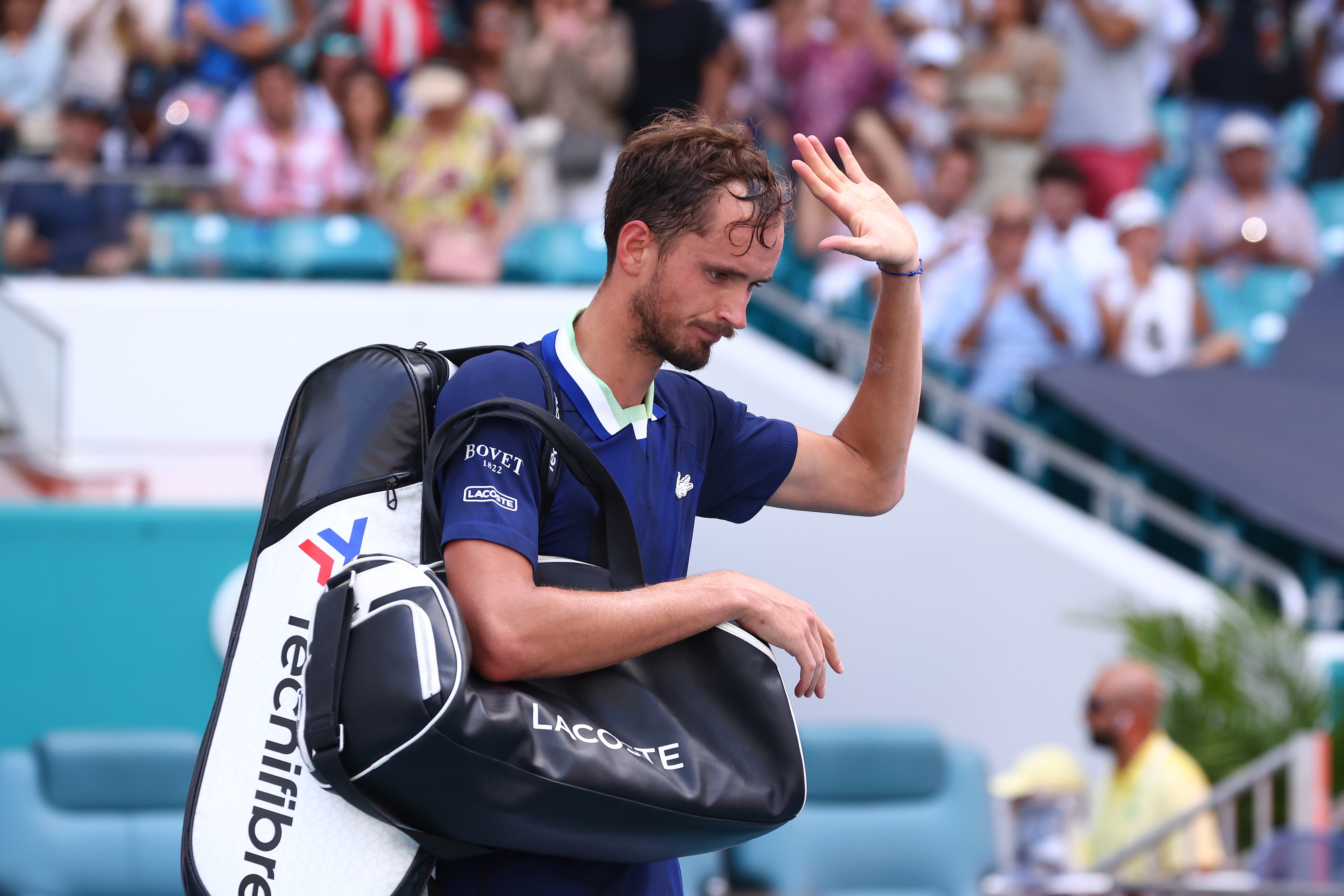 MIAMI GARDENS, FLORIDA - MARCH 31: Daniil Medvedev of Russia waves to the crowd as he leaves the court after losing to Hubert Hurkacz of Poland in their Men's quarterfinal match during the Miami Open at Hard Rock Stadium on March 31, 2022 in Miami Gardens, Florida. (Photo by Michael Reaves/Getty Images)
